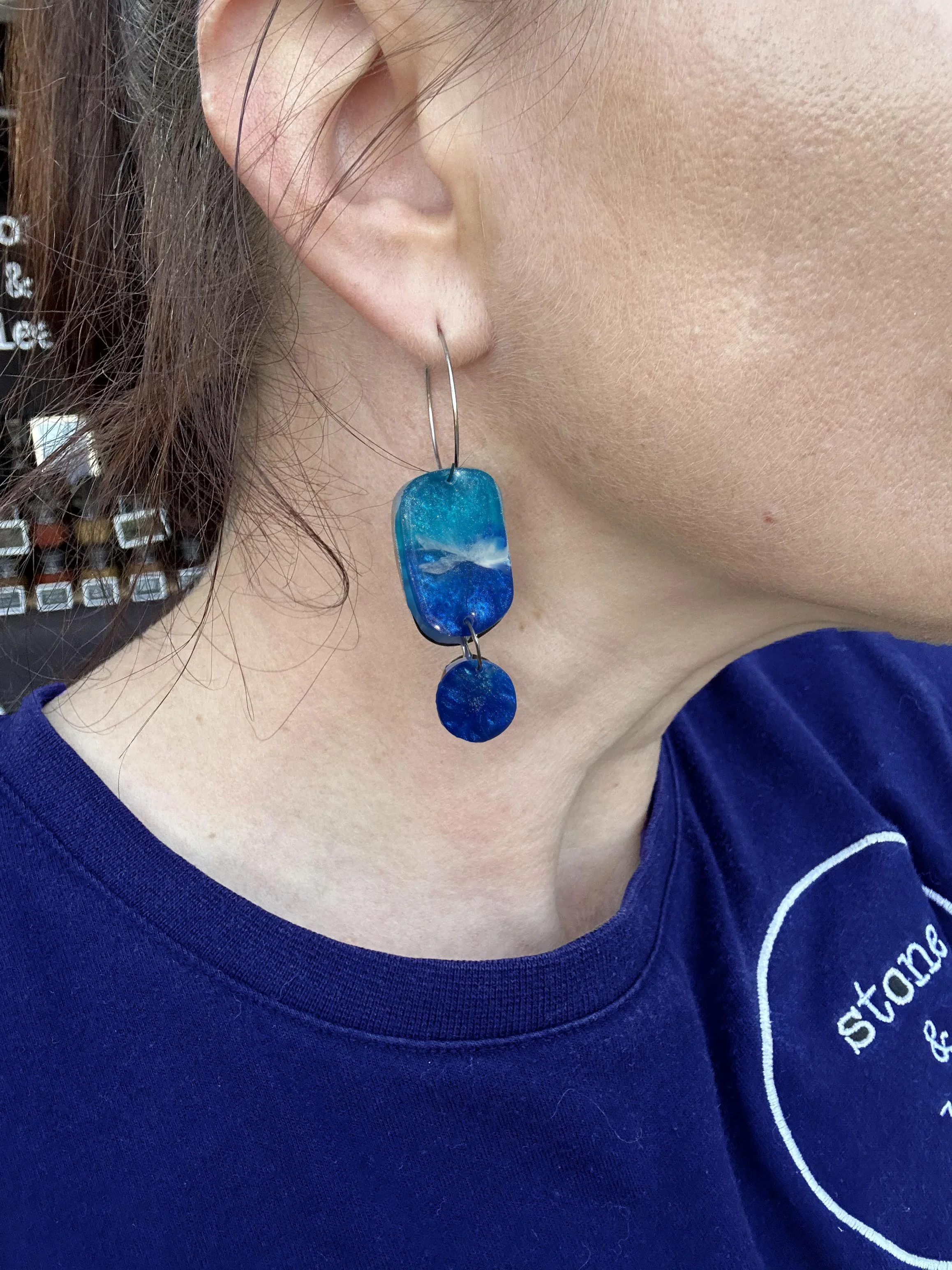 blue wave earrings on sister.jpg