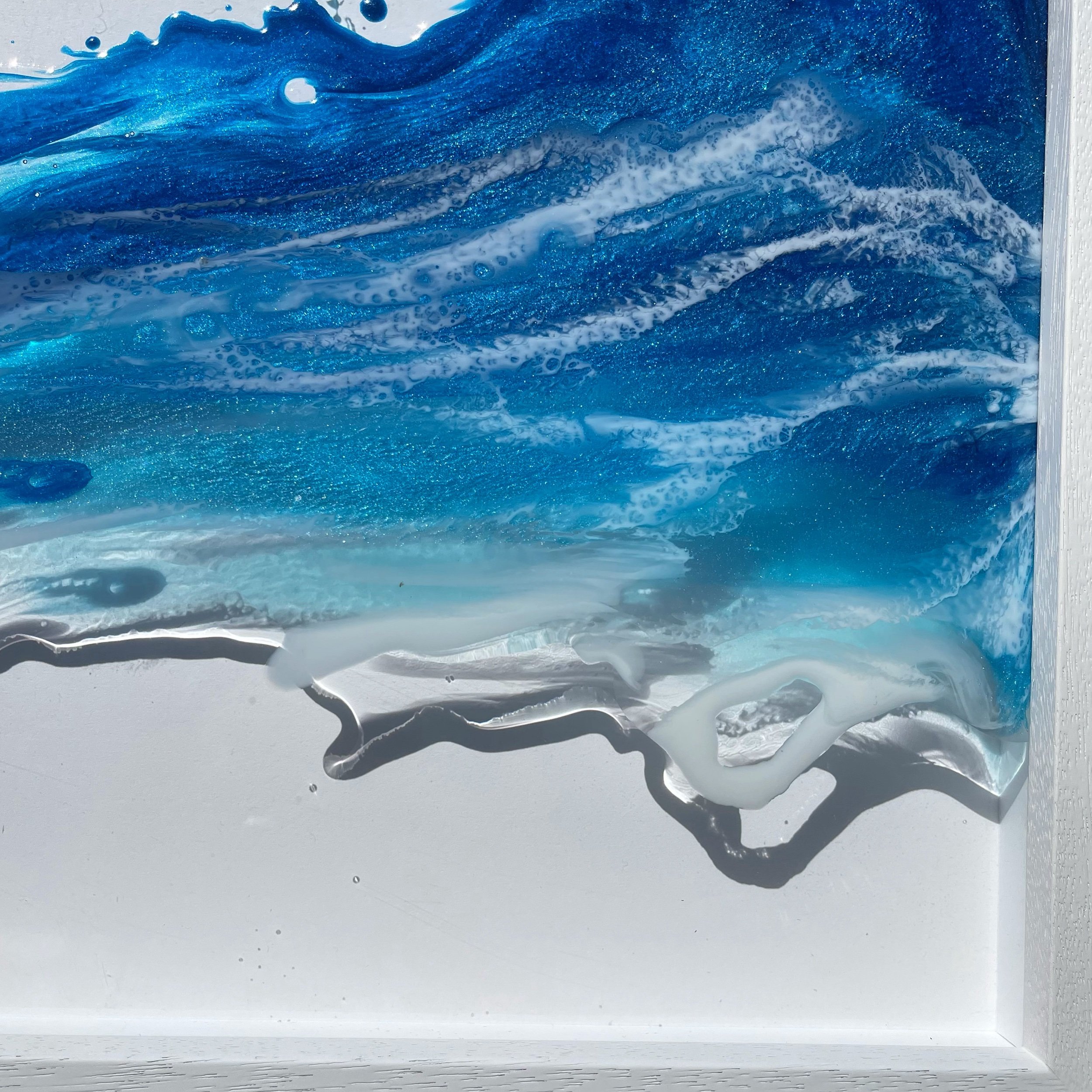 Clear resin ocean artwork. Brenda Stone Art, 2023. 