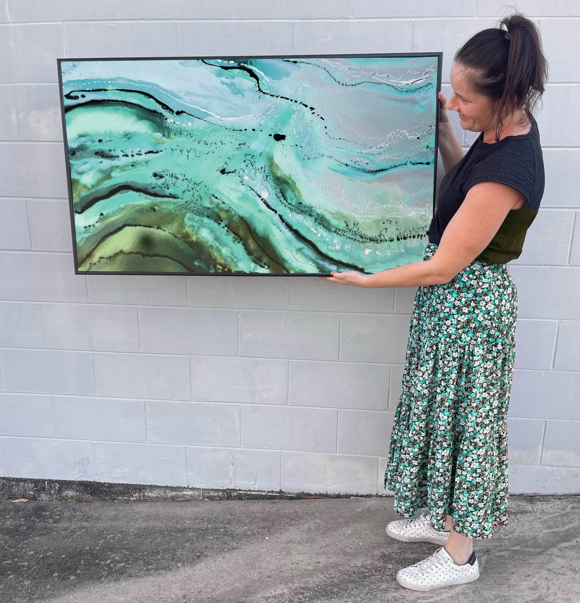HOLDING GREY ARTWORK blue green framed in black.jpeg