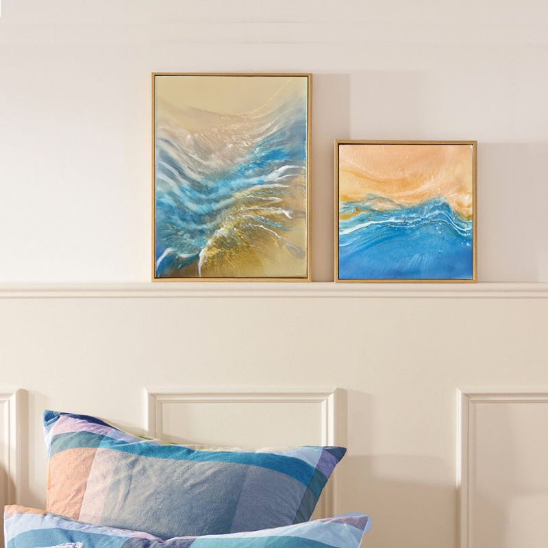 Resin artworks staged on wall above bed 2026.jpg