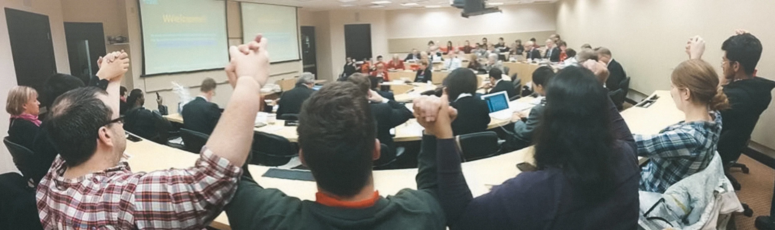 University of Alberta students opposing the international differential fee increase at the Board of Governor's meeting in December 2013. Credit: Joshua Le.