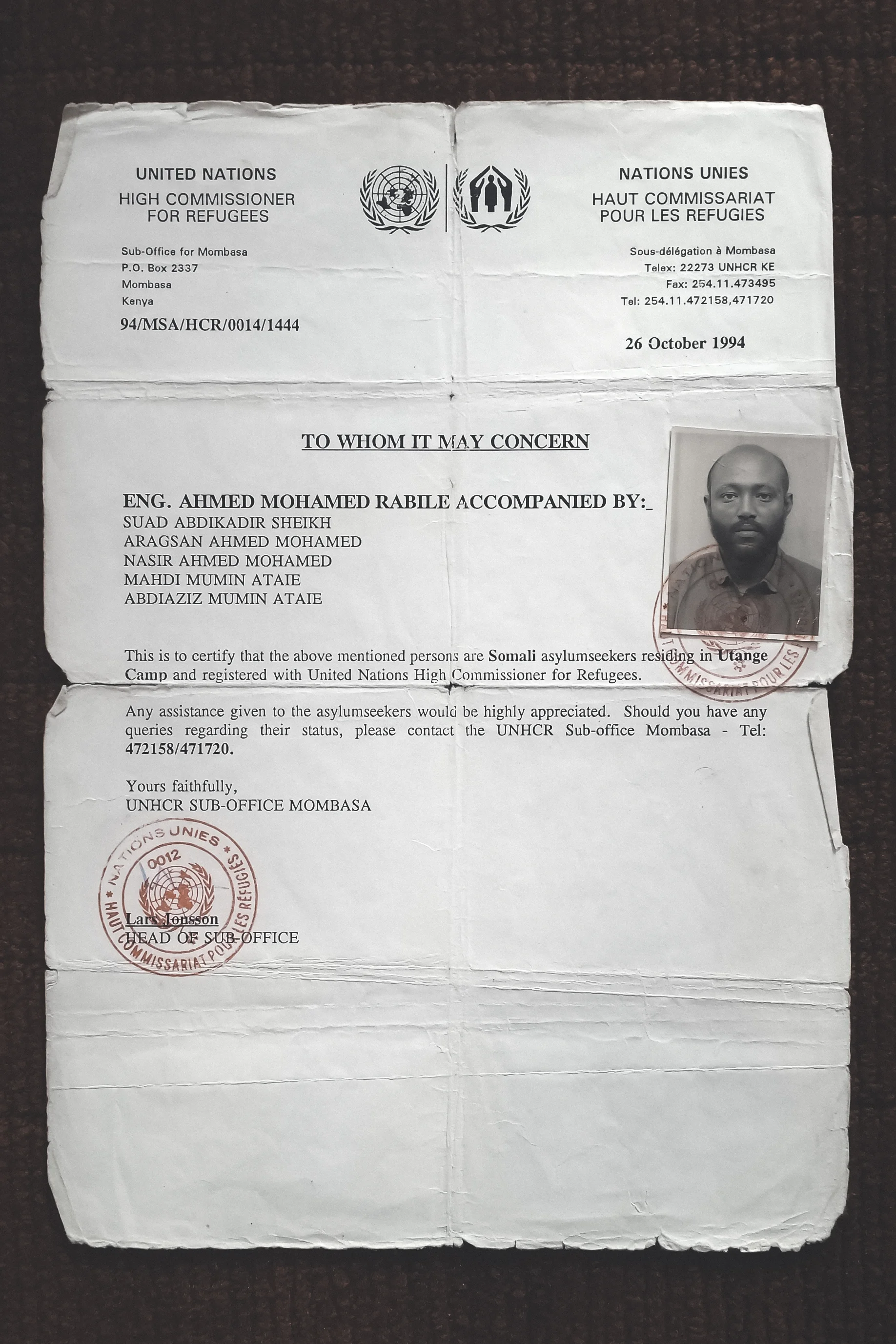 A document issued to my family by the UNHCR to prove that we were asylum seekers. The man in the photograph is my father.