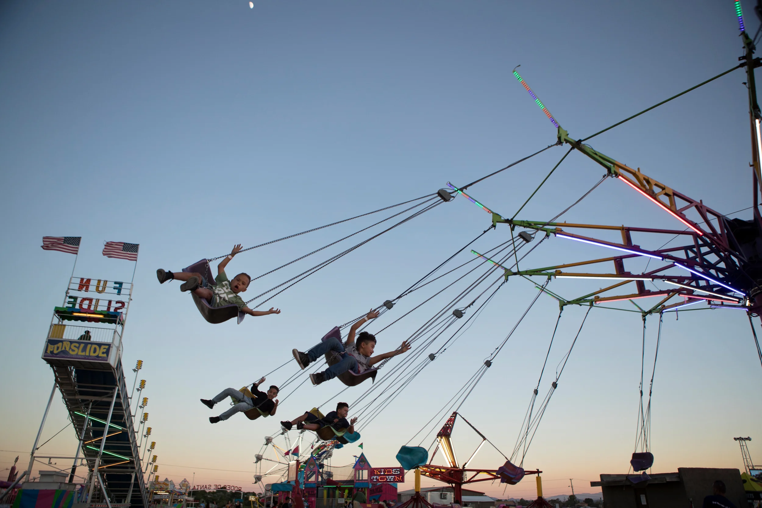 Chasing the light.  Rodeo de Santa Fe, June 21, 2018.