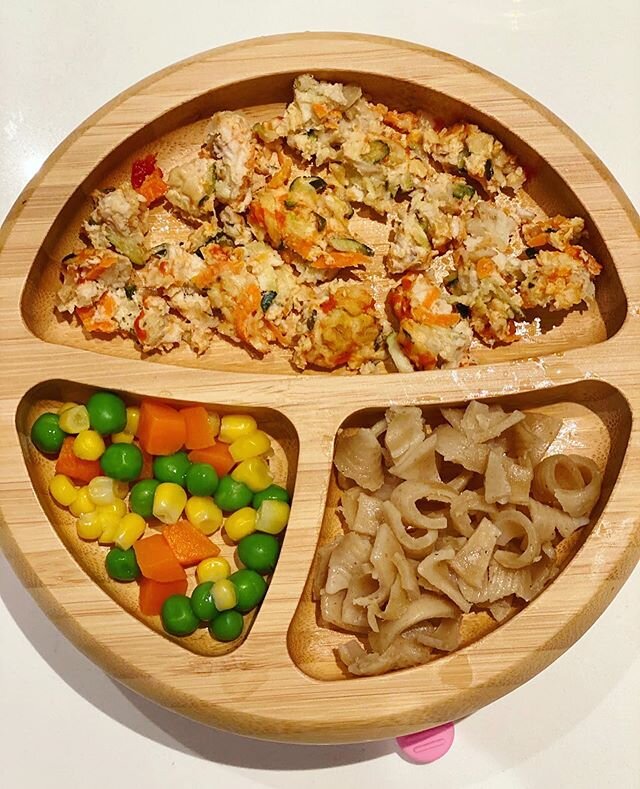 A look at a typical meal for Baby M! This meal was turkey veggie meatballs, whole wheat pasta and a mix of peas, carrots &amp; corn. We don't reinvent the wheel for Baby M's meals! For the most part, she eats what we are eating with a few small chang