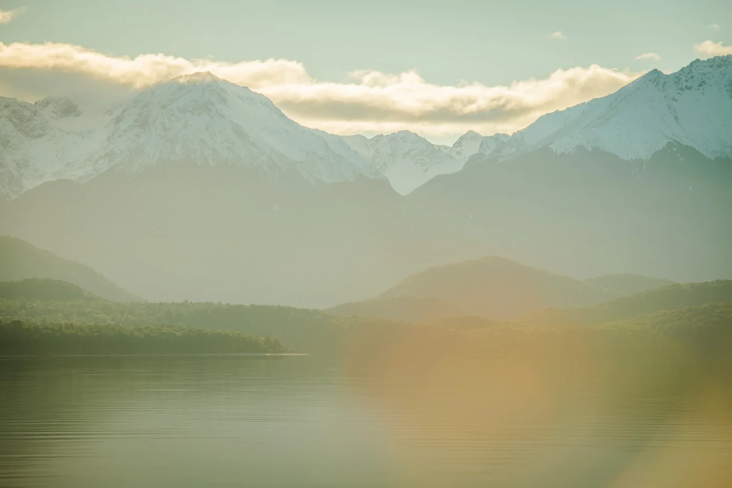 Light Flares Across Lake Te Anau as I was scoping out lines for the sunset shoot