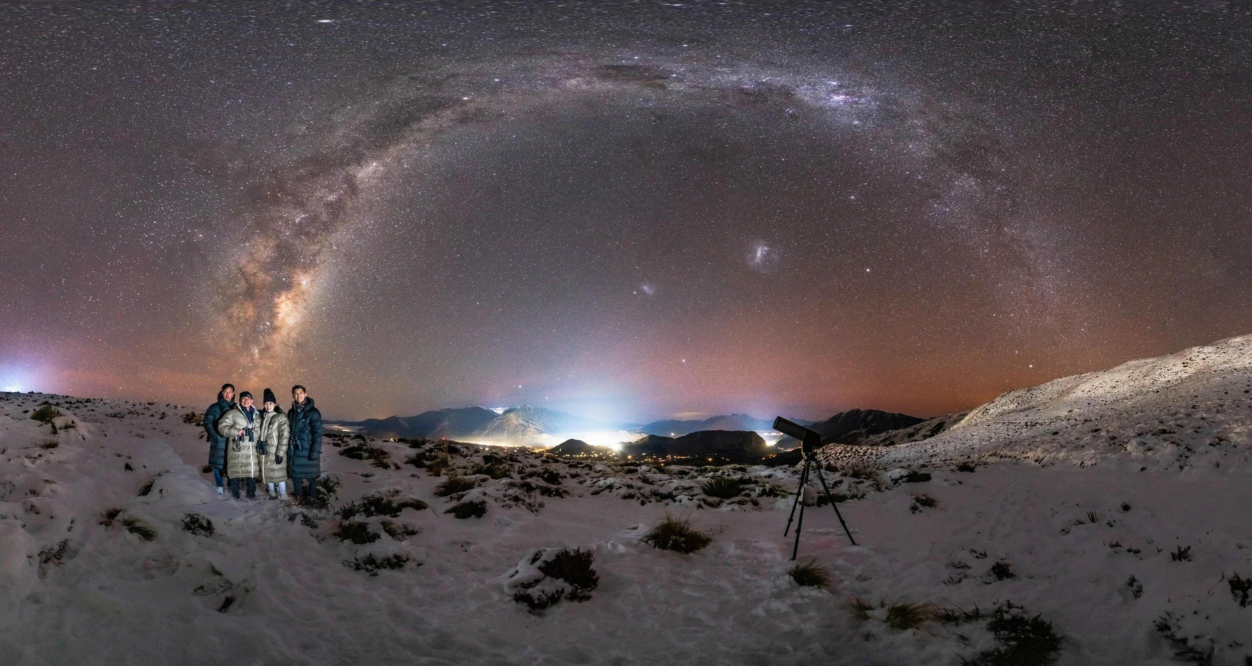 Private stargazing experience above Queenstown in the snow using binoculars and the Unistellar telescope, professionally photographed