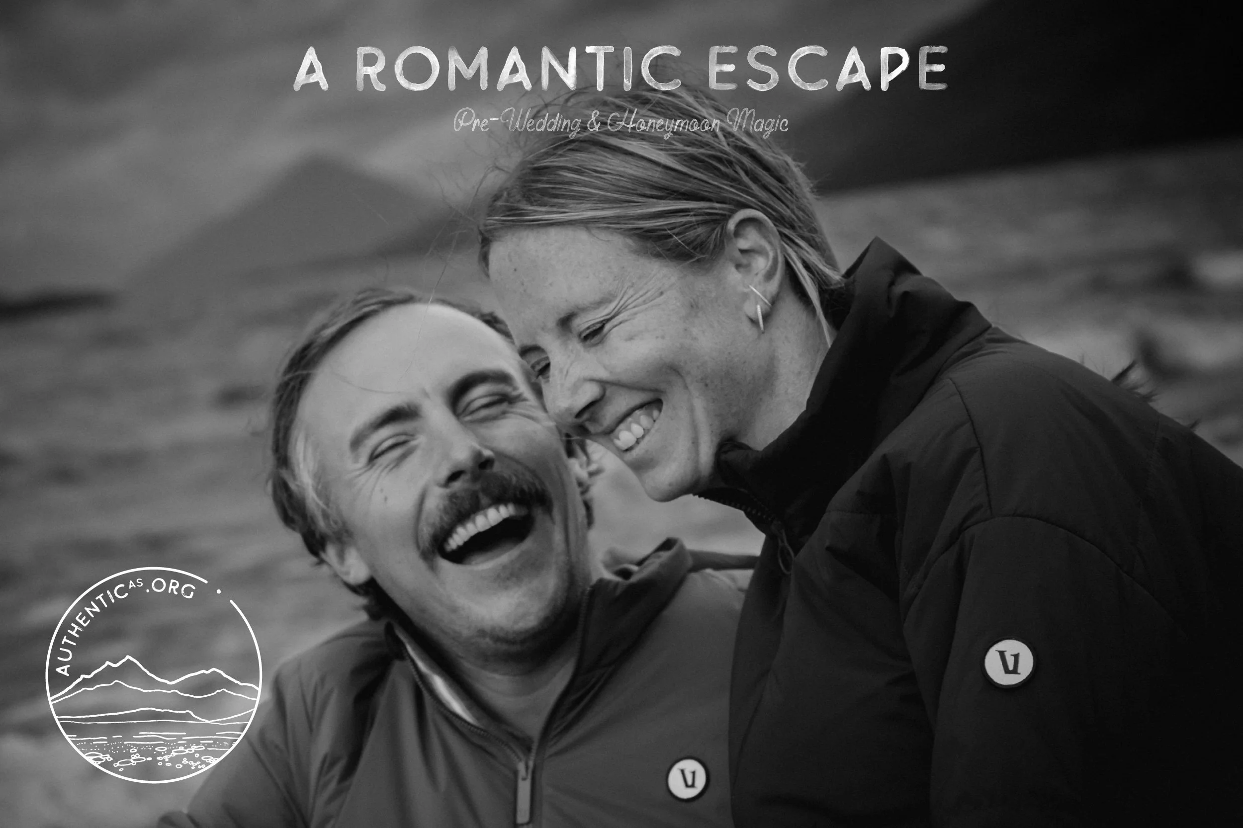 Honeymooning couple sharing a light-hearted moment on the shores of Lake Whakatipu