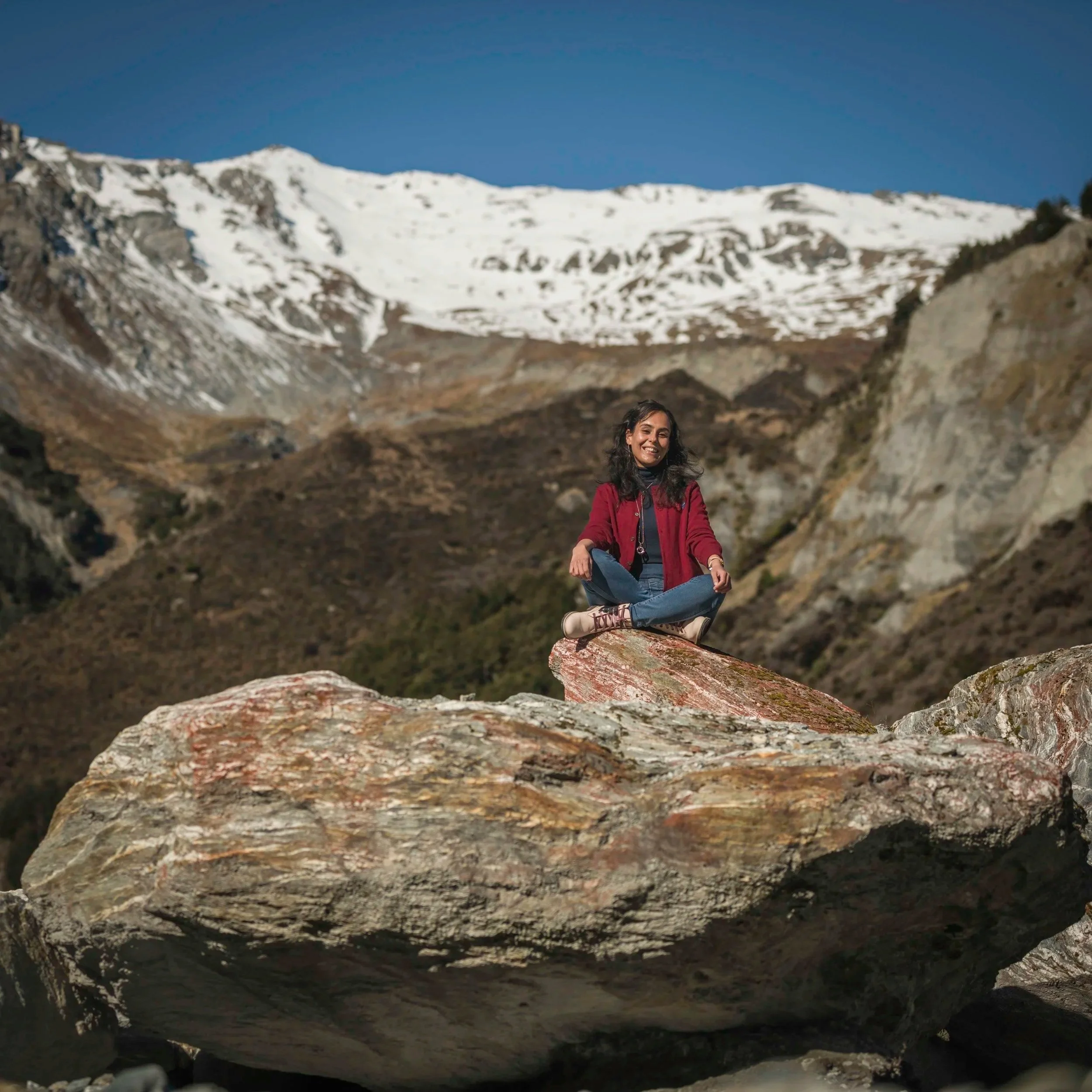 Solo traveller soaking in the immense landscape of the Dart Valley - guided and photographed by LSPNZ photographer Simon Williams - Owner / Operator of authenticAs Queenstown & Glernorchy