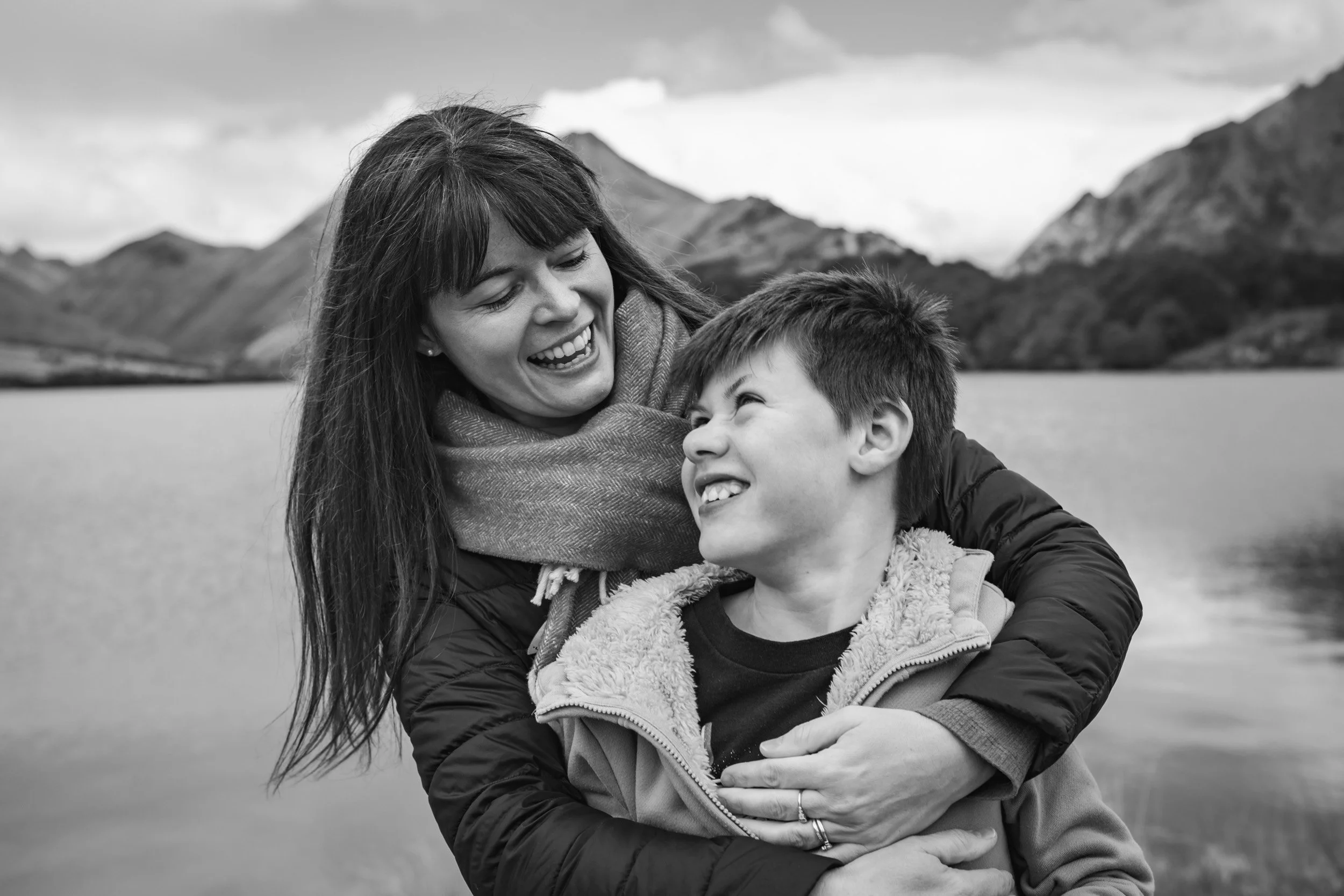 Mother and son embracing during a private guided tour around Queenstown, professionally photographed