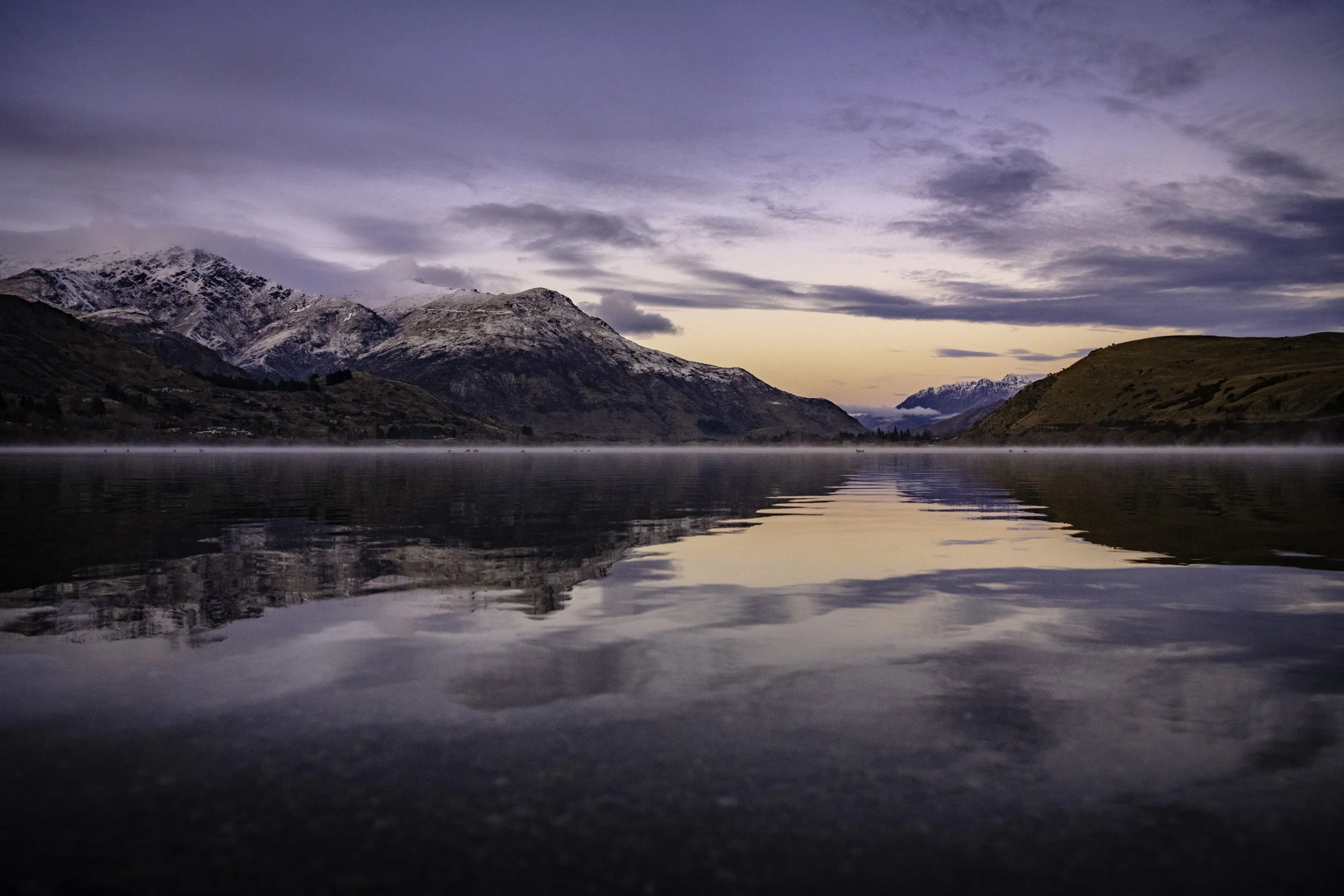 Early morning reflections across Waiwhakaata (Lake Hayes), Queenstown, New Zealand