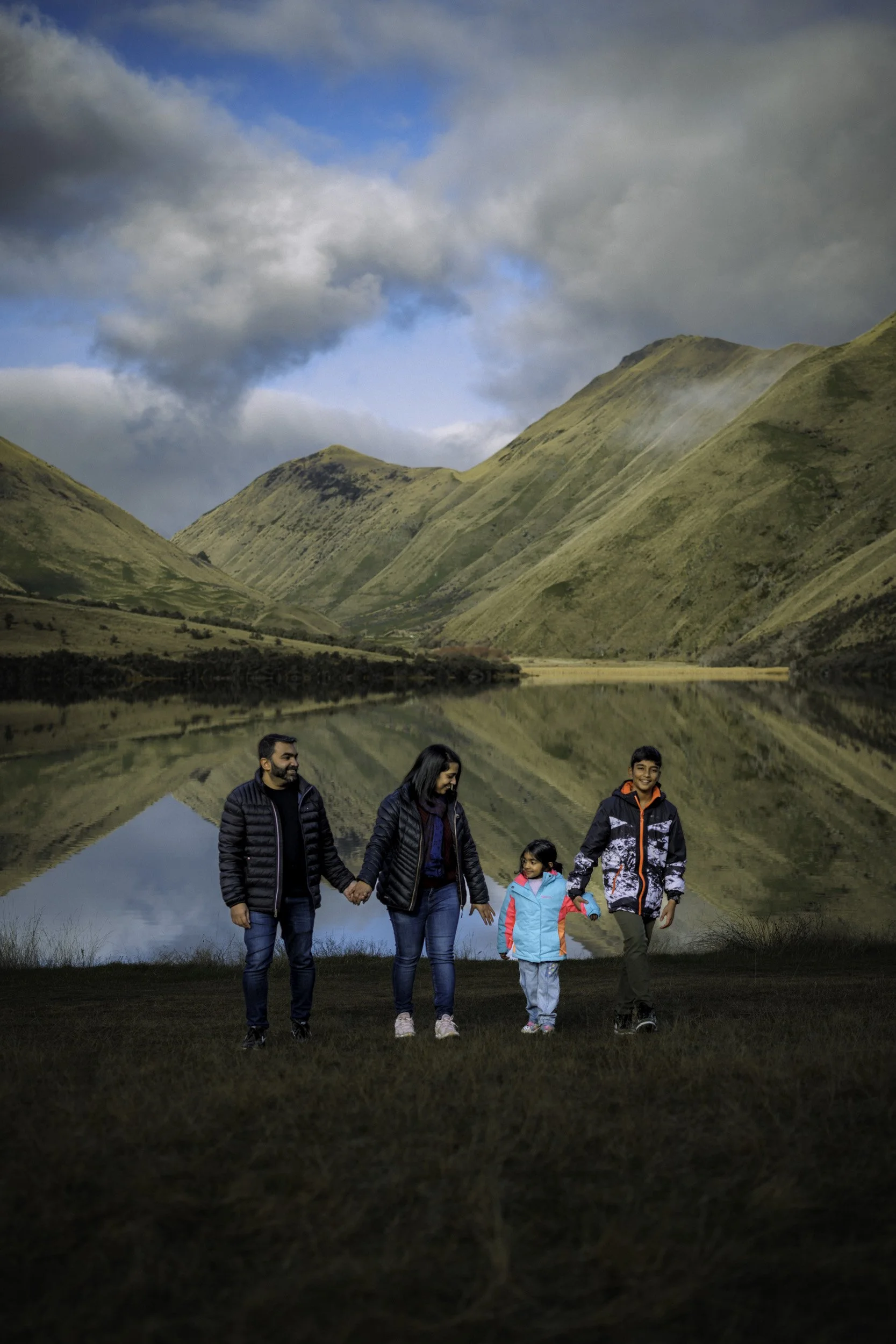 Family photographed at Moke Lake, enjoying the scenery during a private guided tour