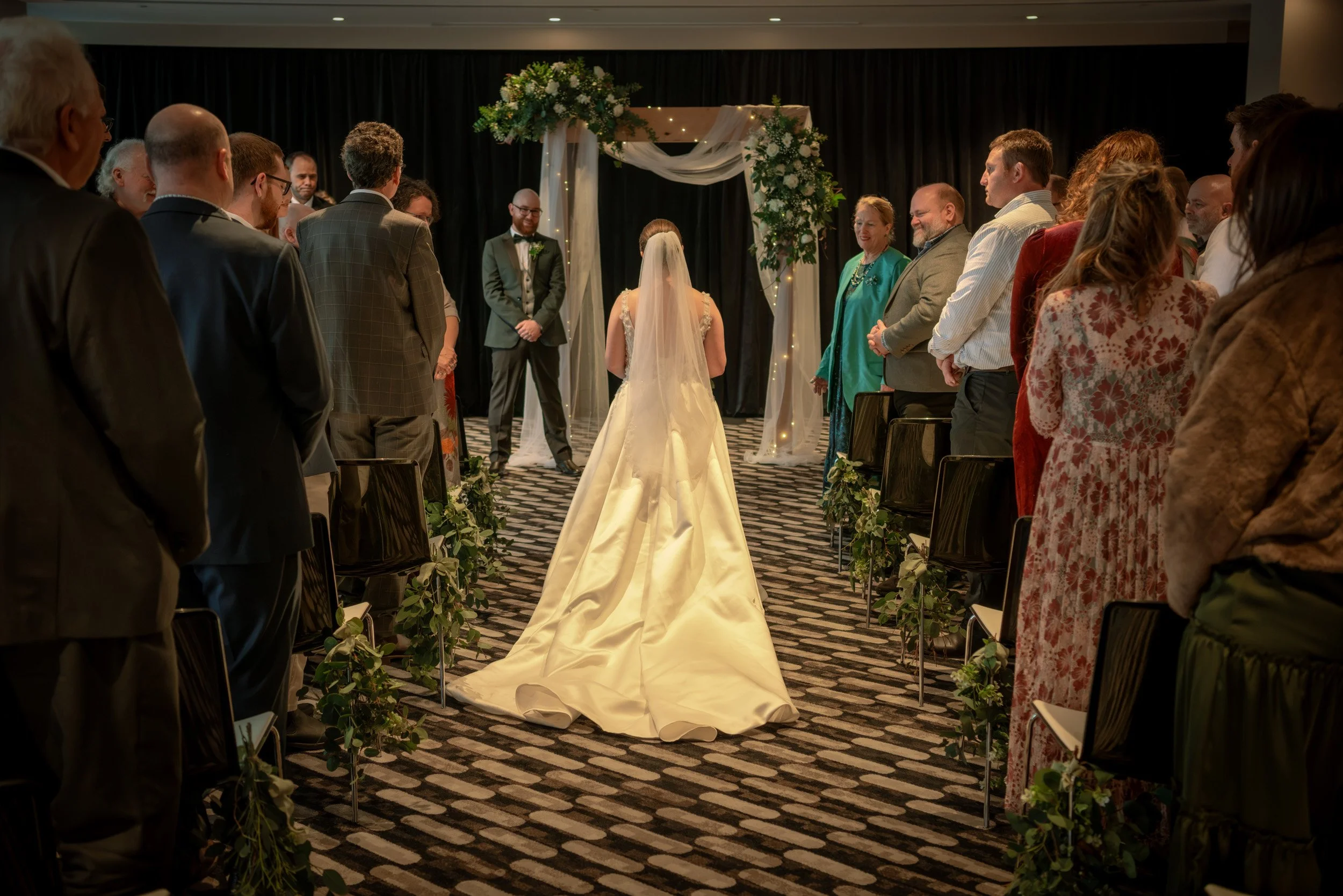 Bride walking down the aisle at her Queenstown wedding, QT Hotel