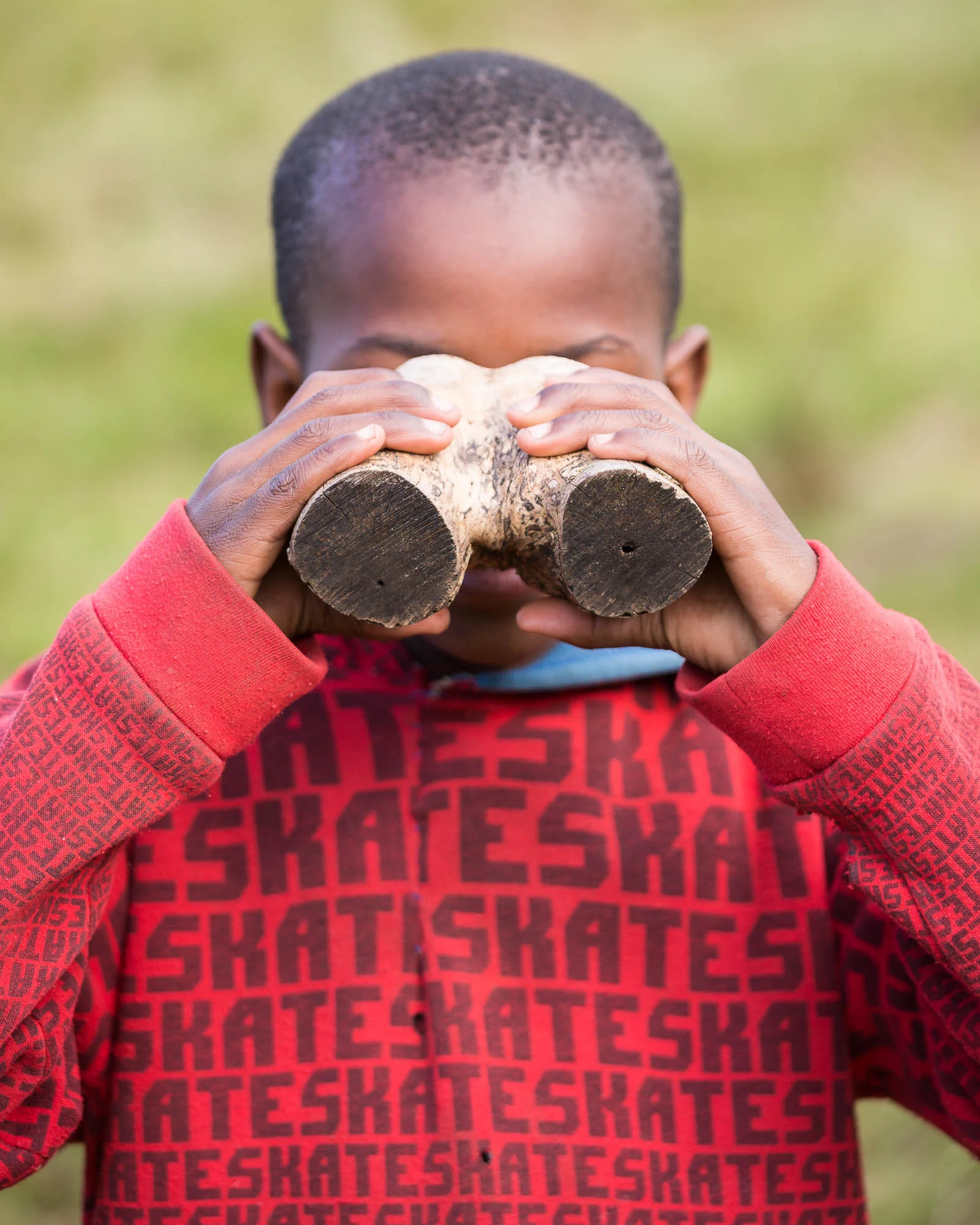 A Magwa Falls 'guide' sporting a set of faux binoculars.
