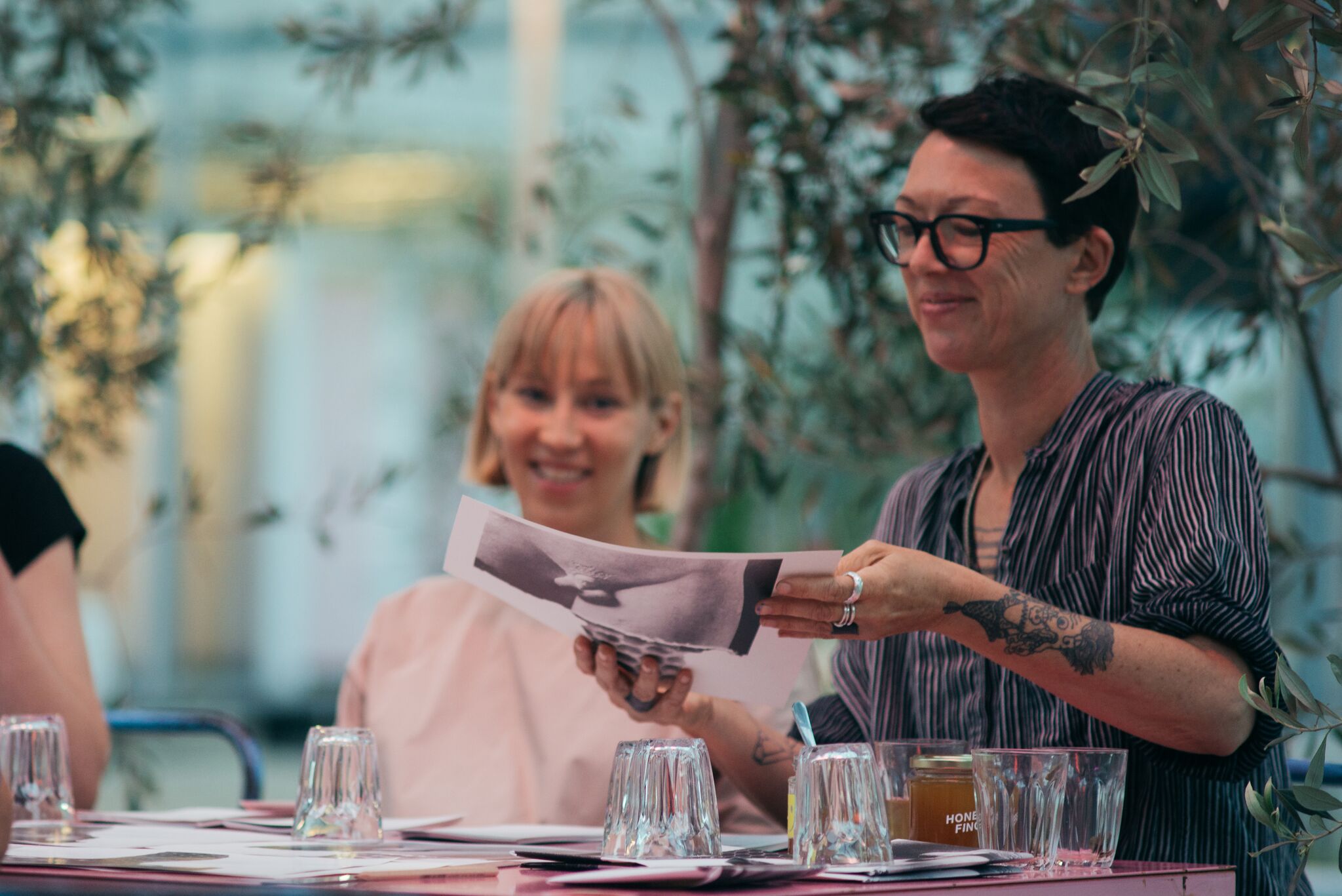 There is Room at The Table; audience detail receiving personalised poem from Honey Fingers at Testing Grounds for Forum of Sensory Motion, November 2017