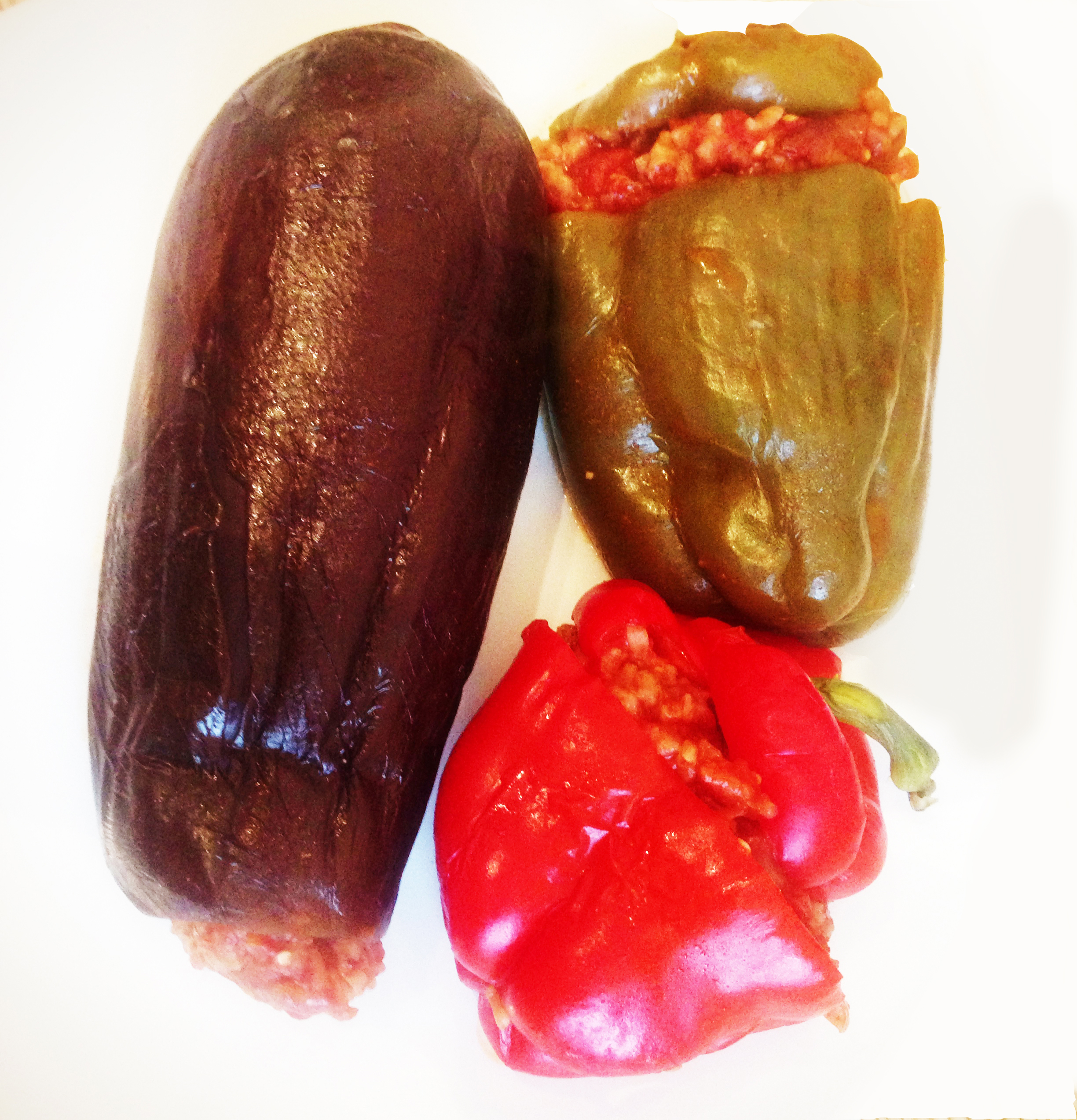 Stuffed aubergine and peppers