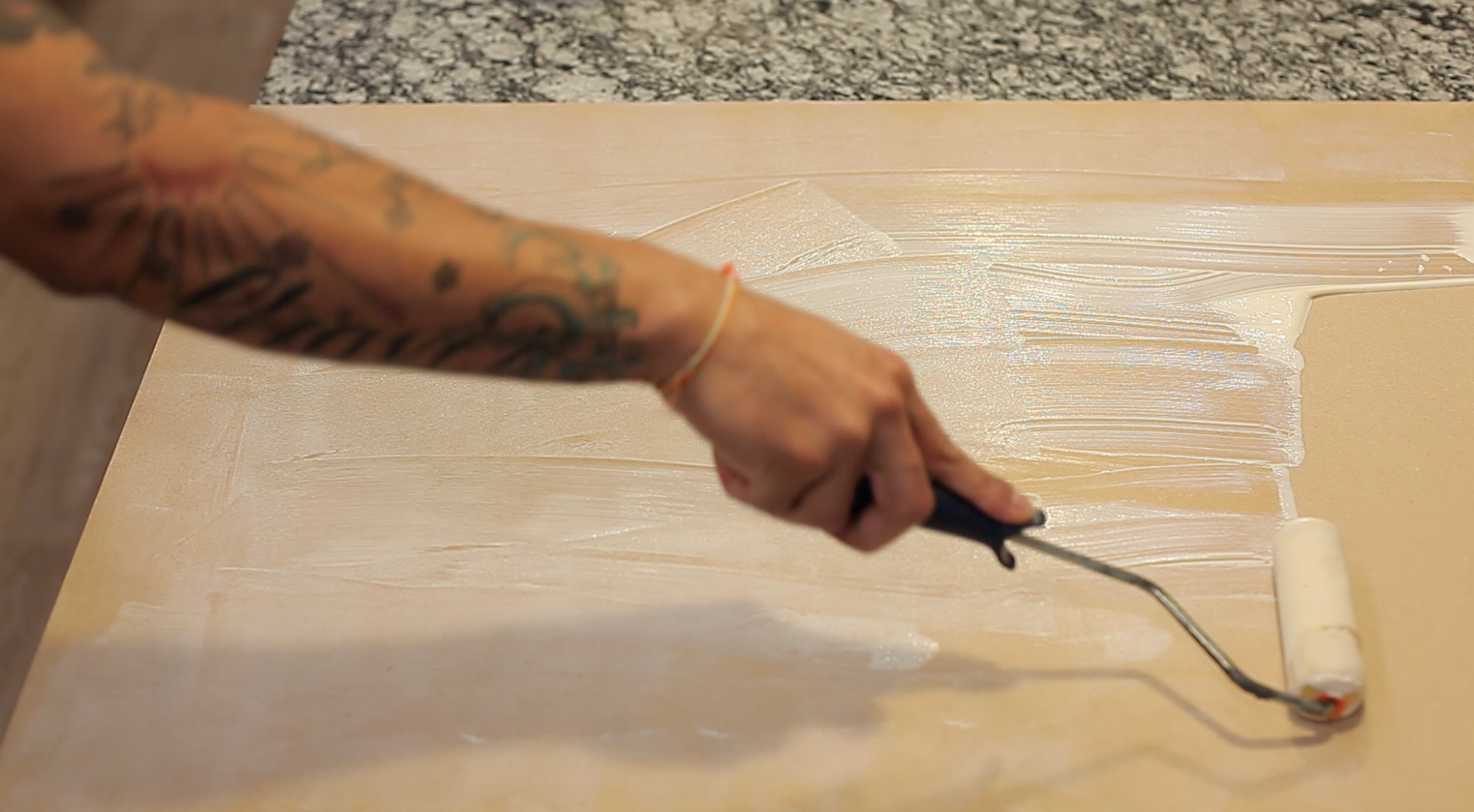 Using your paint roller, apply the adhesive evenly. After applying the adhesive, let it dry for about 3-5minutes. Don't be afraid of the adhesive drying up, It will bond better with the cork. 