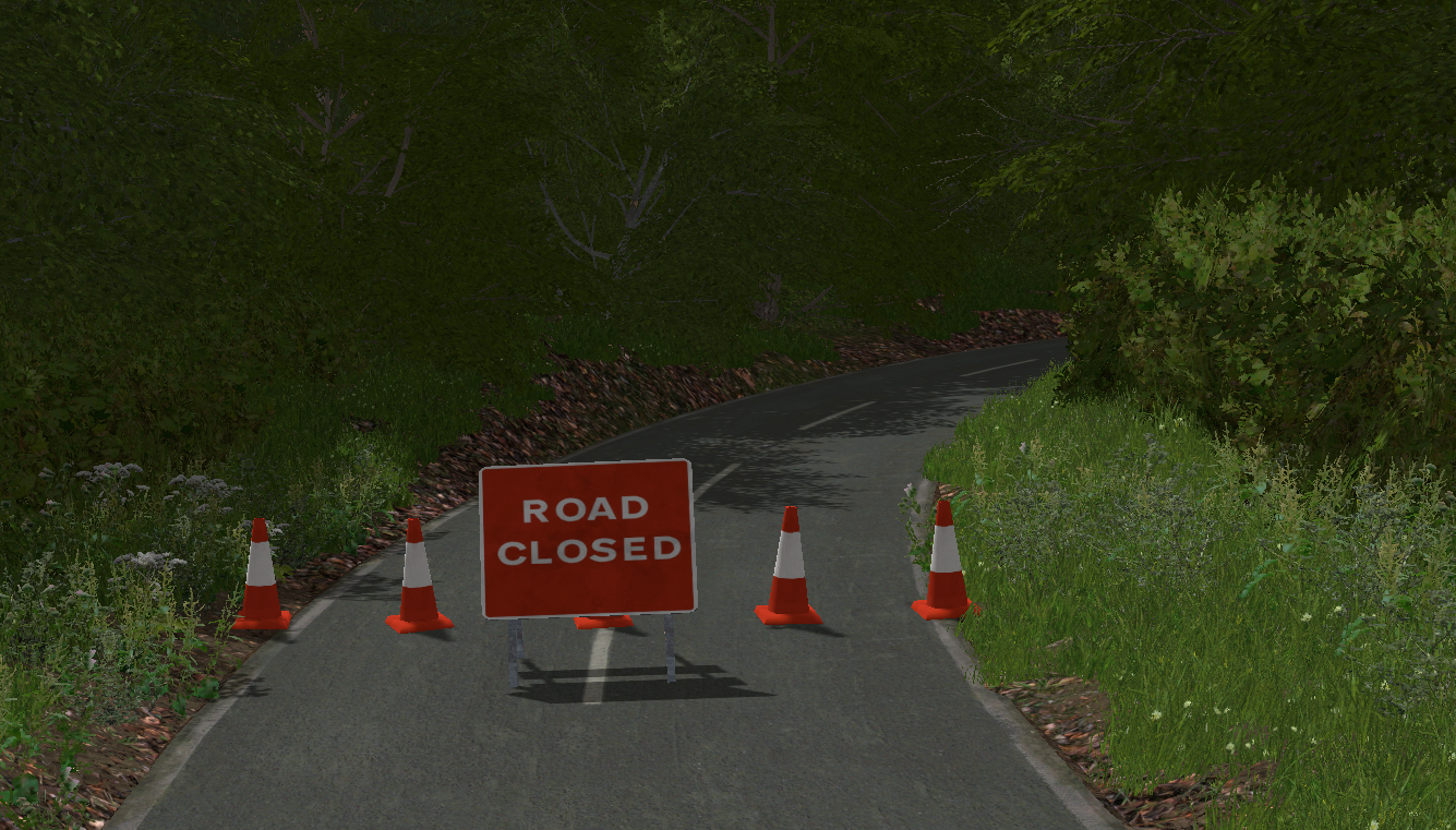 Road Closed barriers used in Coldborough Park Farm. The of the bend in the road adds to the illusion that the road goes on.