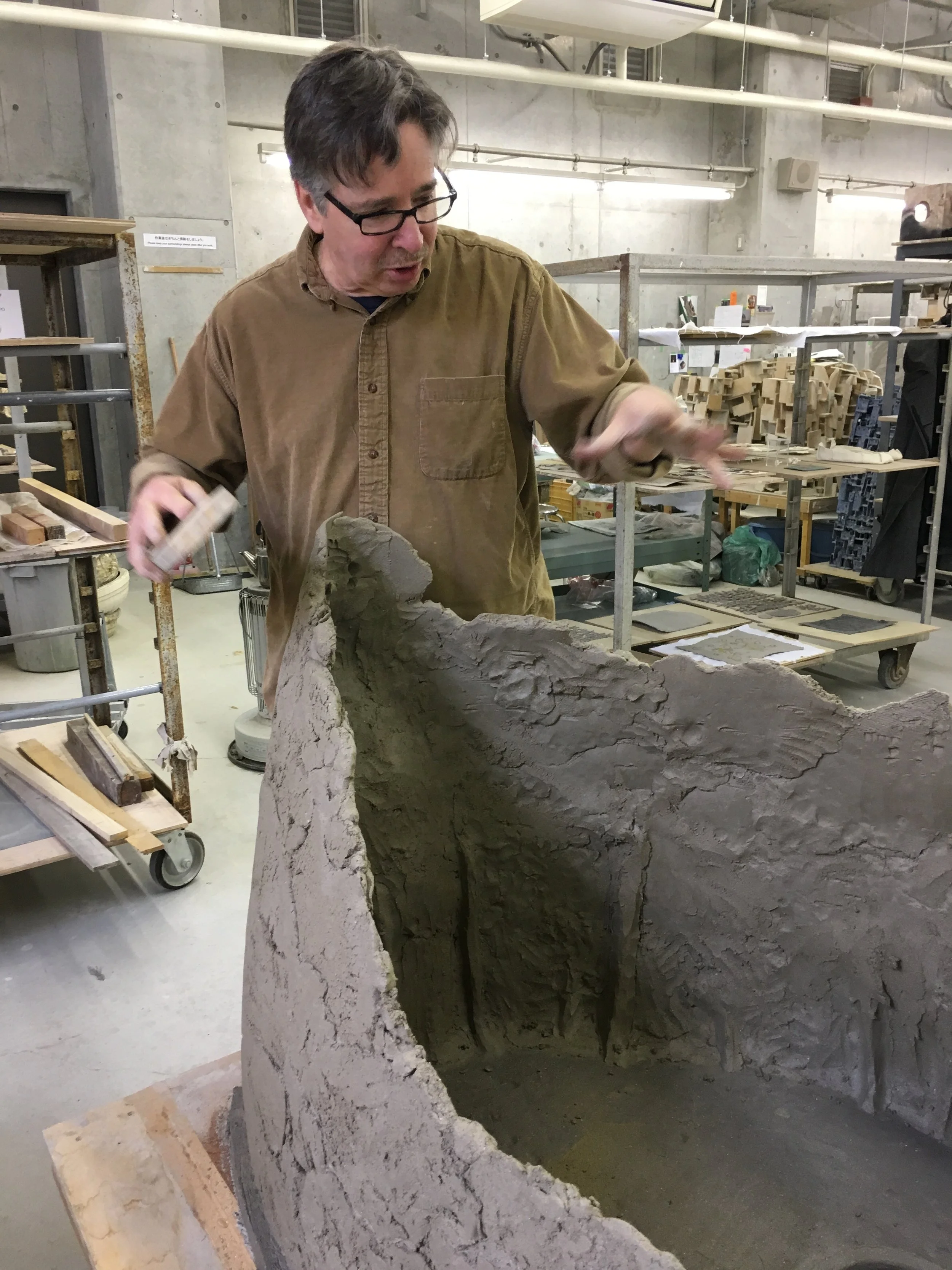 Garrett's ambitious sculpture in 'un-pugged' clay is taking shape.