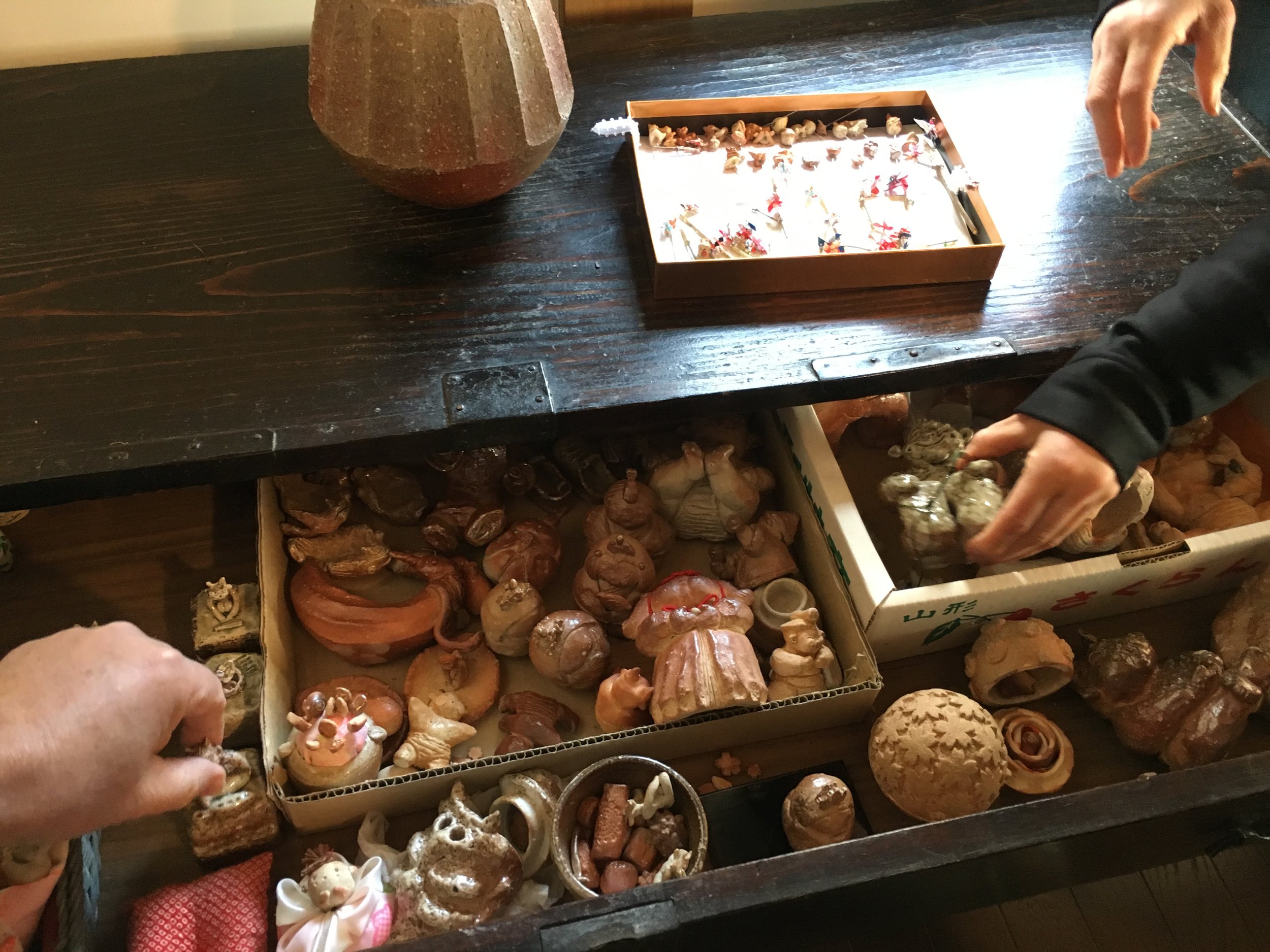 Masami's collection of ceramic figures and animals.