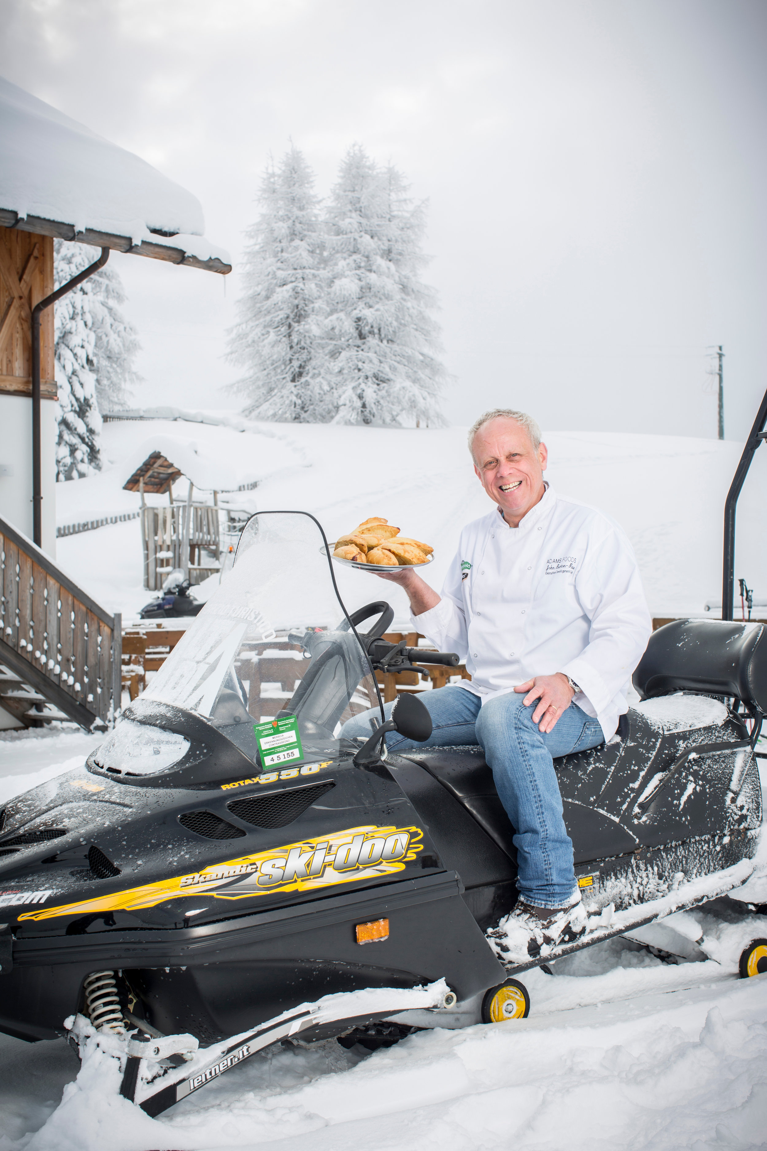 British Chef John Burton Race on a skidoo in the Italian Alps.jpg