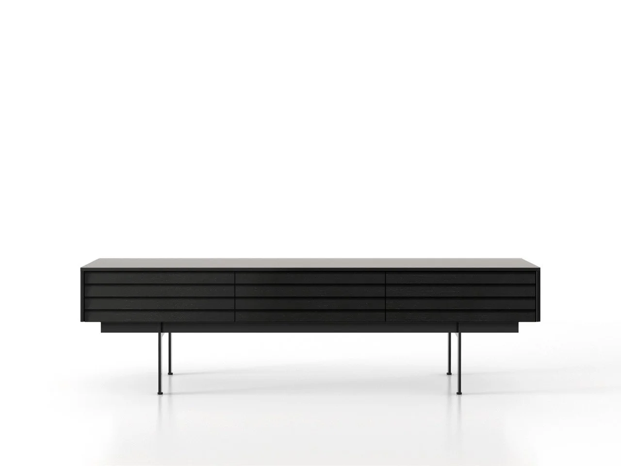 Schwarzer, moderner TV-Schrank vor weißer Wand.