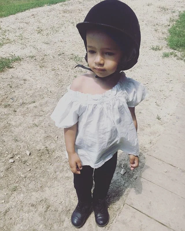 My first horseback riding lesson! They said I was a professional, had great form, and the best riding outfit yet!! A natural.