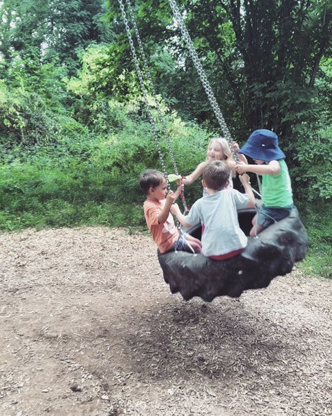 Abergavenny Kids on a tyre swing
