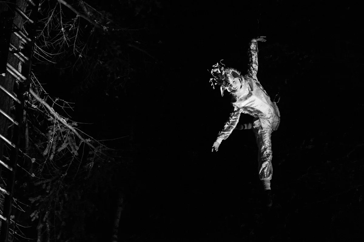 trapeze-artist-black-white-enchanted-forest-lighting-event-pitlochry.jpg