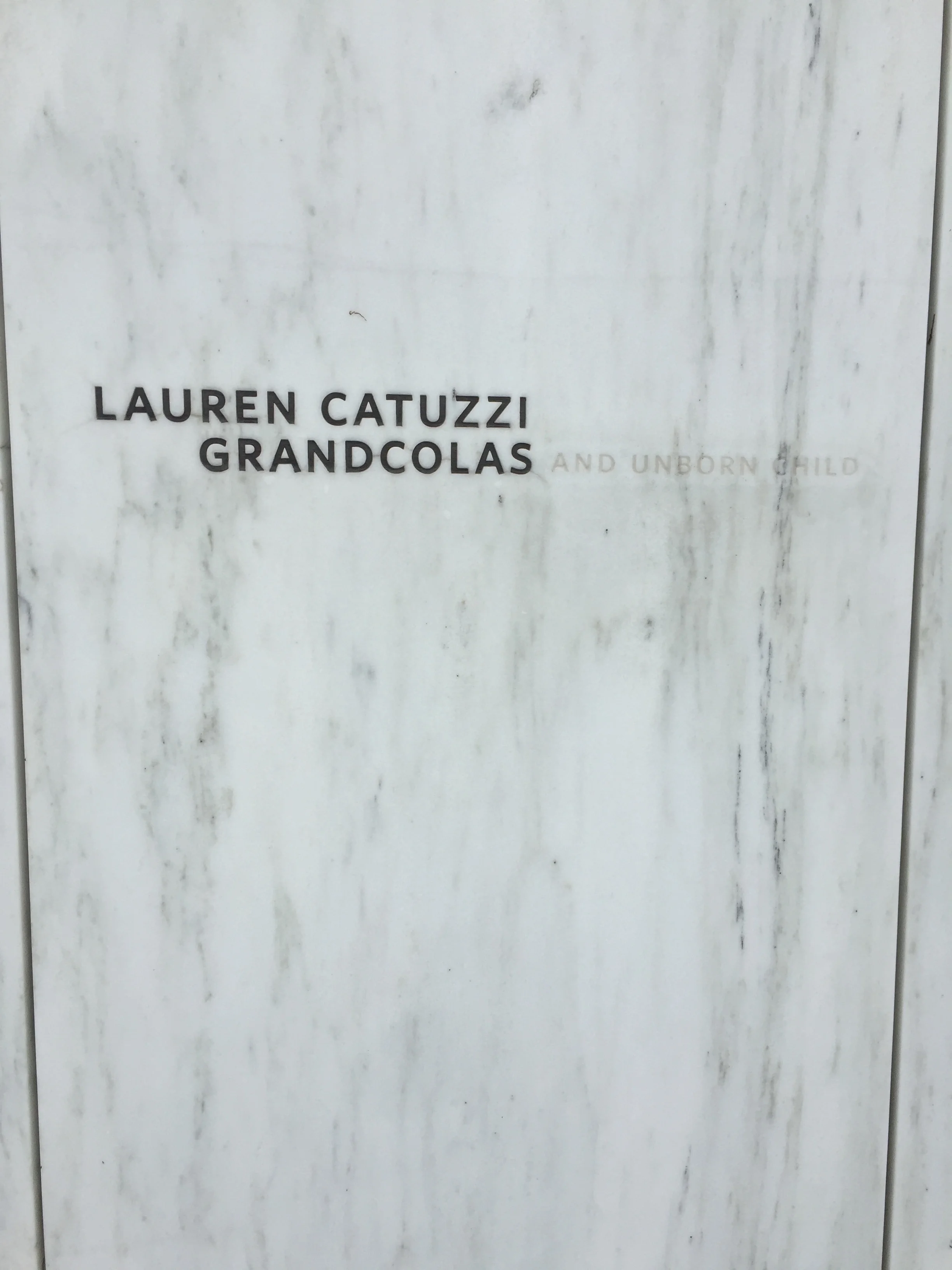 Each passenger and crew member had their own stone panel at the crash site. This one was particularly touching due to the "and unborn child" inscription next to the name.