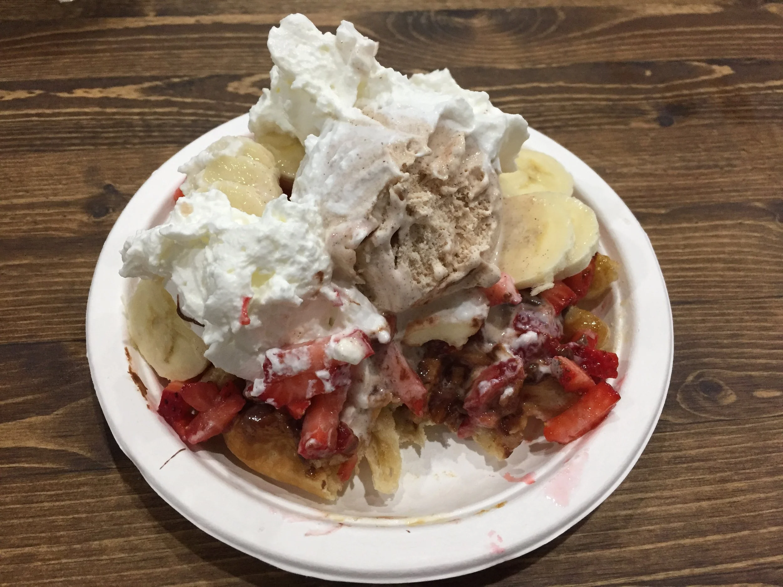 My waffle at Waffallonia, complete with strawberries, bananas, cinnamon ice cream, homemade whipped cream, and Nutella.