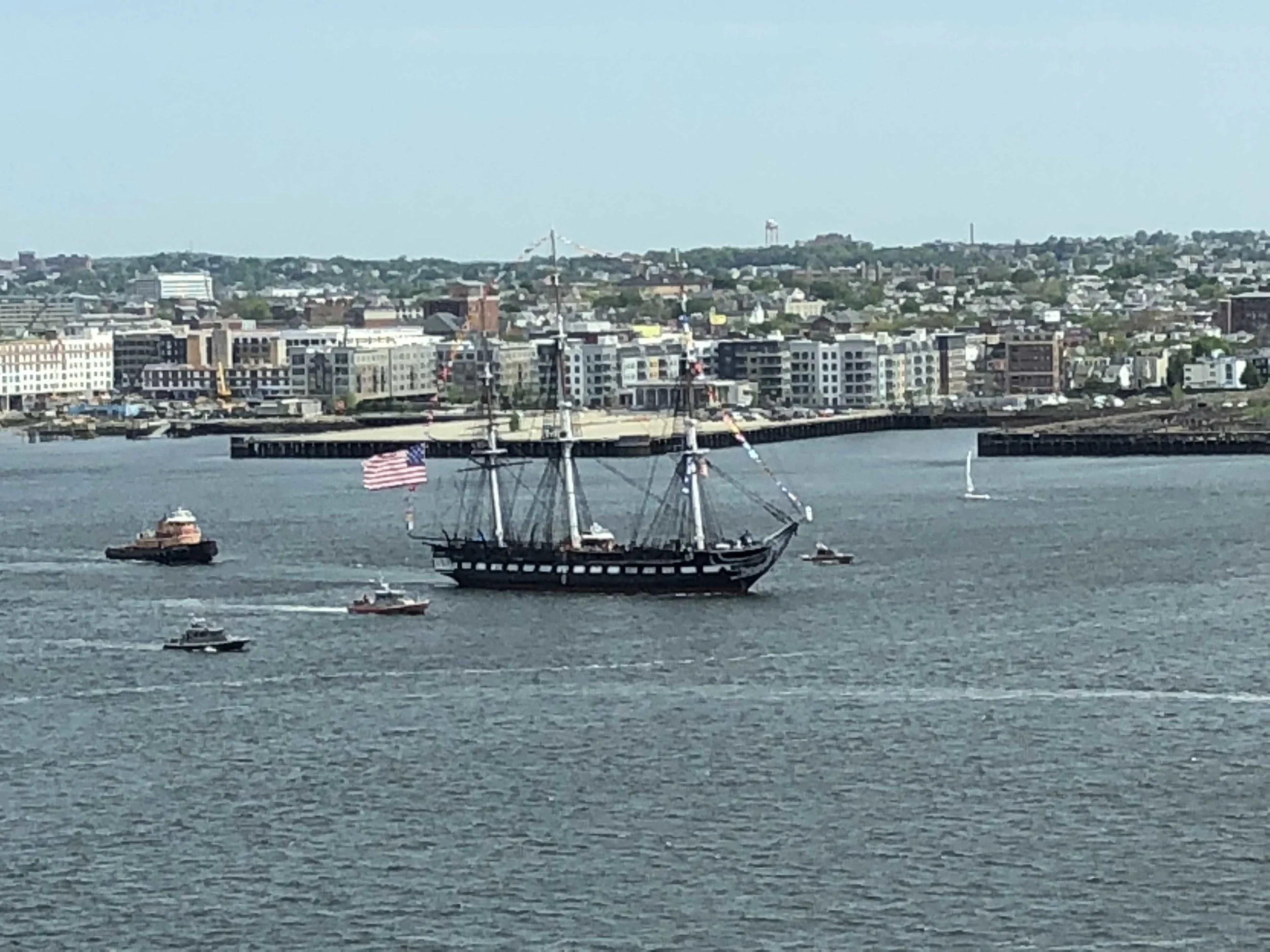 Looking out the window of my office at the USS Constitution. (Grainy photo, but I zoomed way in.)