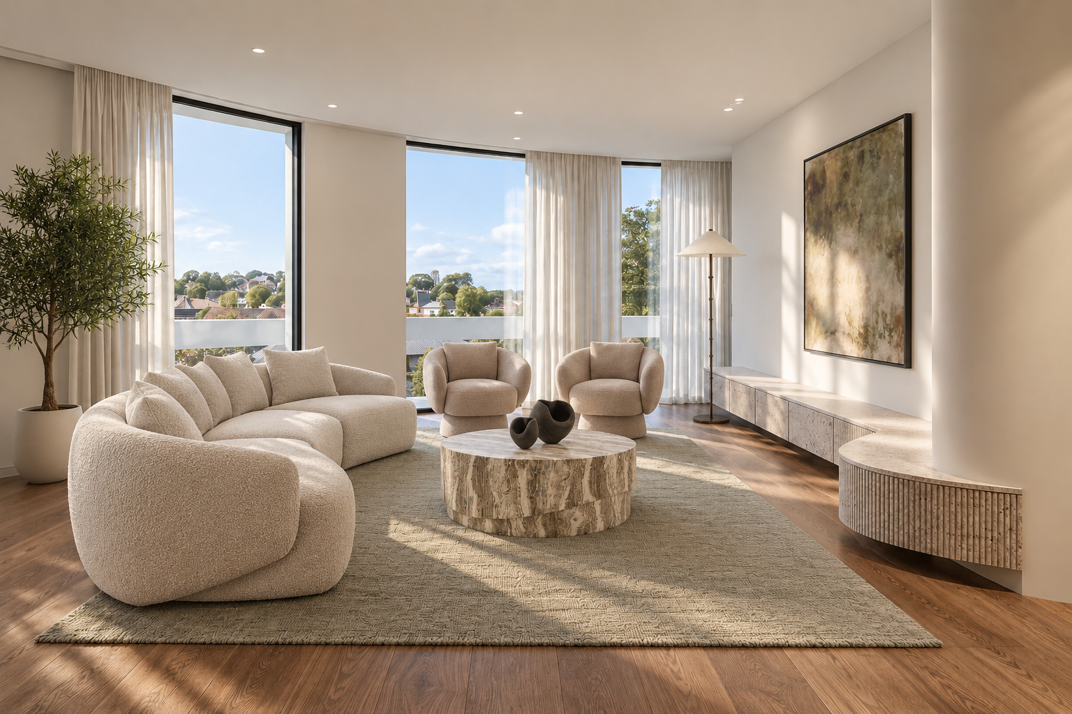 Contemporary luxury living room styled with neutral boucle furniture, sculptural stone coffee table and soft olive tones by a Sydney interior stylist.