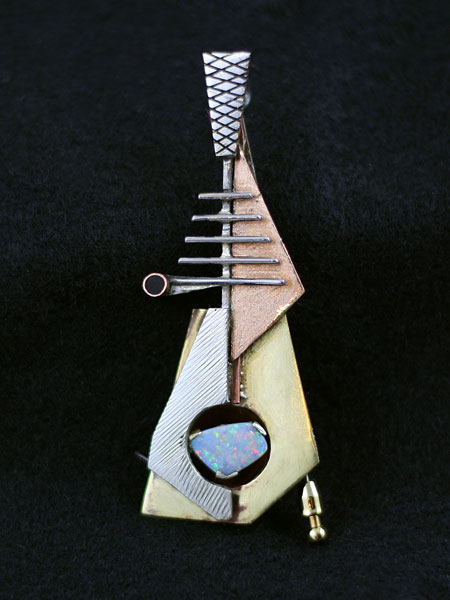   Daniel Macchiarini ,&nbsp;2009 Australian white opal, gold, sterling silver and copper, with inconel center frame. 