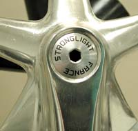 Threaded crank cap with a 5mm allen slot.