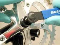 Remove the crank arm by turning the driver clockwise.