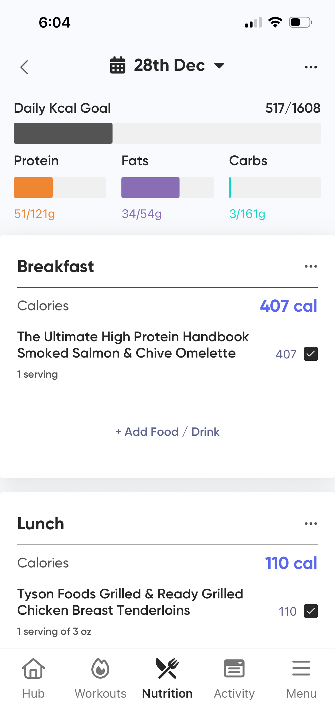 Screenshot of a nutrition tracking app with a date of December 28th, showing calorie counts for breakfast and lunch, including details of meal ingredients.