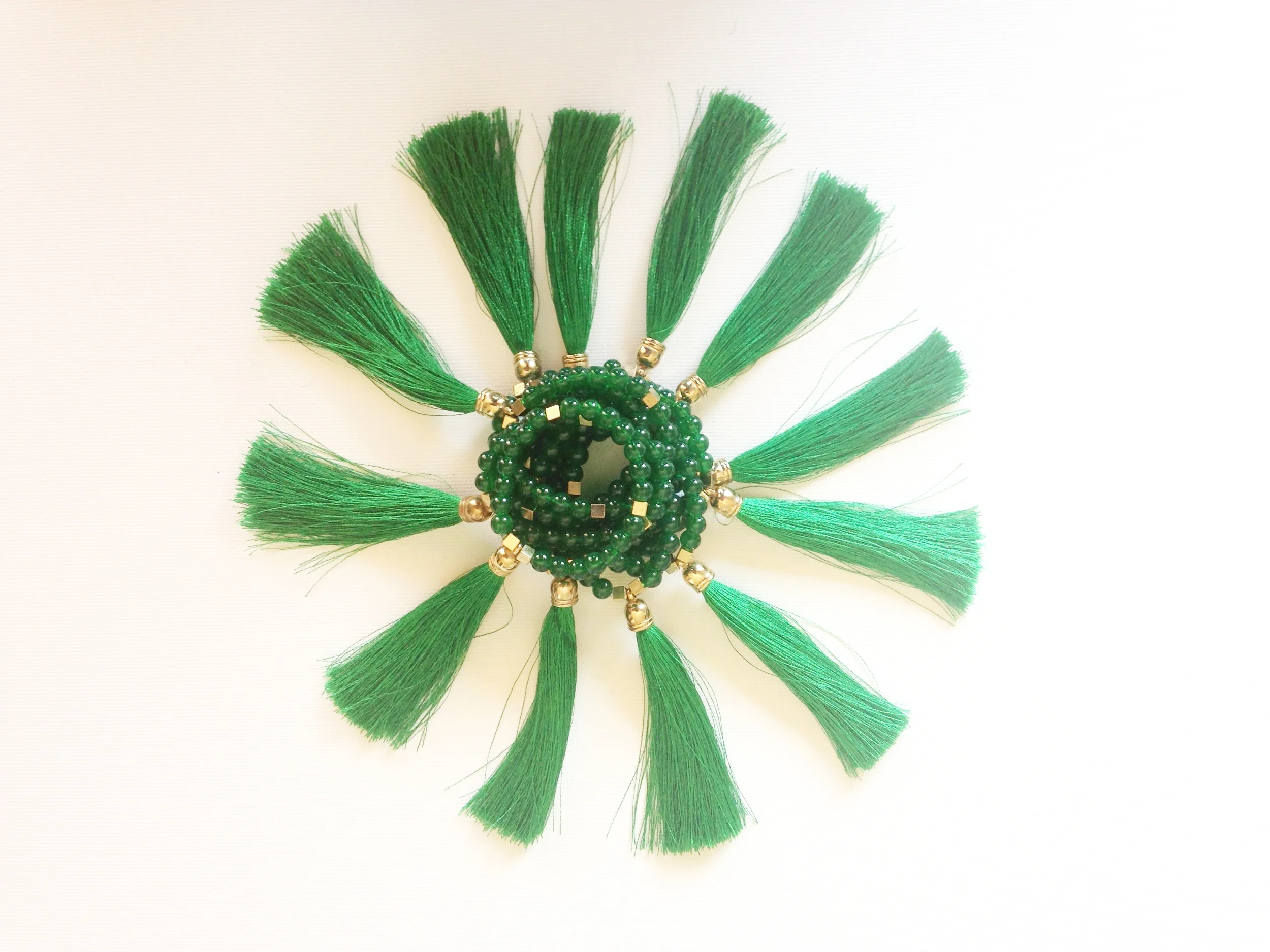  Emerald Green Glass Beads with Matching Silk Tassle. &nbsp; $45 set of 12 . Available in other colors.  
