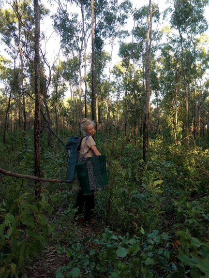 The impressed face of Ellie crying traps in the field at an open woodlands site.