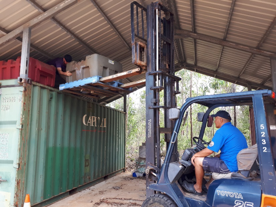 Re-organising the lab equipment with the help of a forklift - thanks Bro!