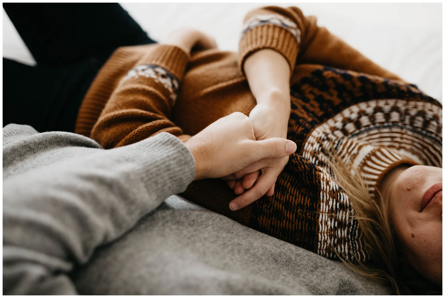 Michigan Couples Session. Couple laying on bed
