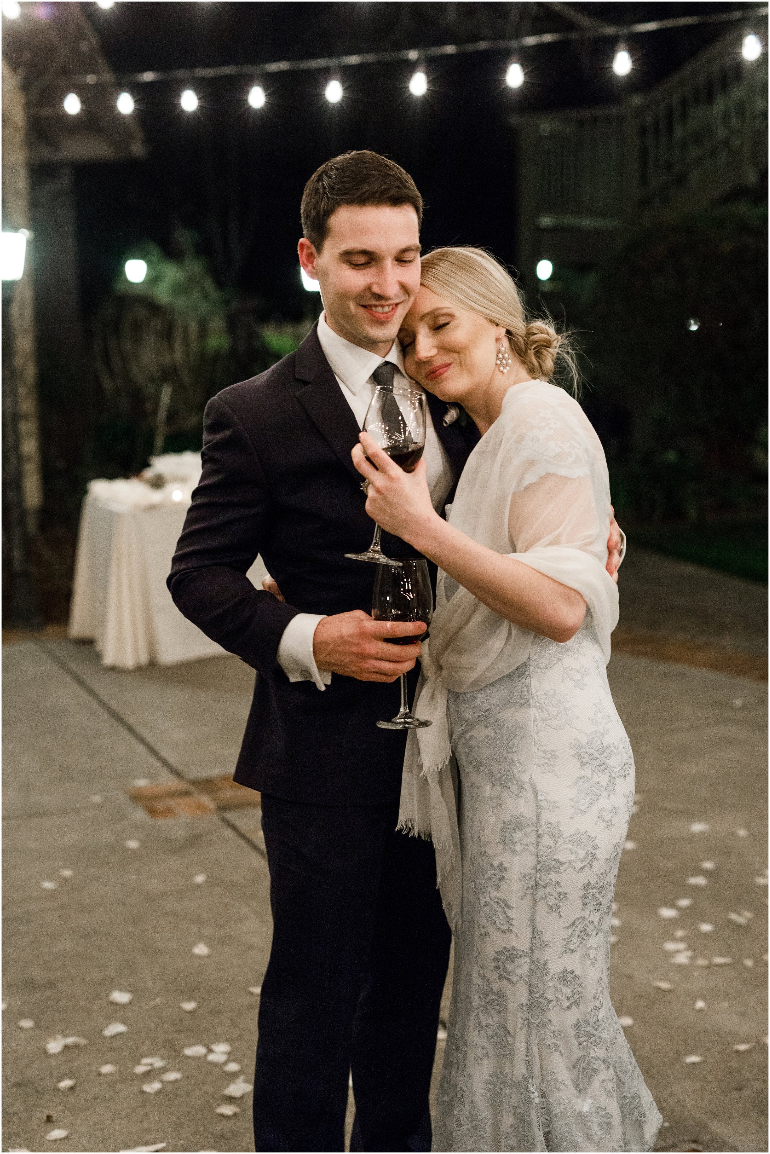 bride and groom embracing during reception