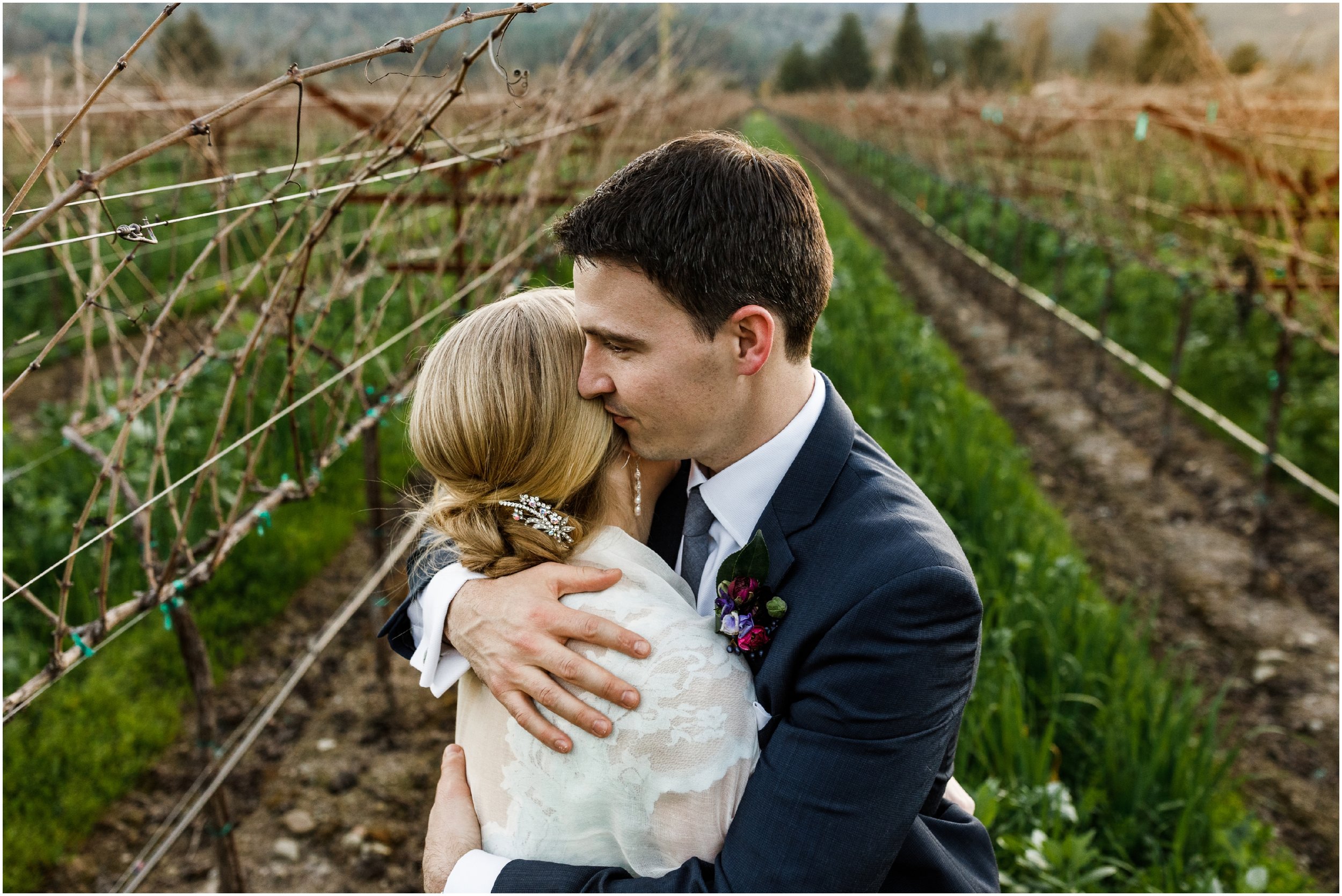 bride and groom embracing in the vineyard at the Harvest Inn