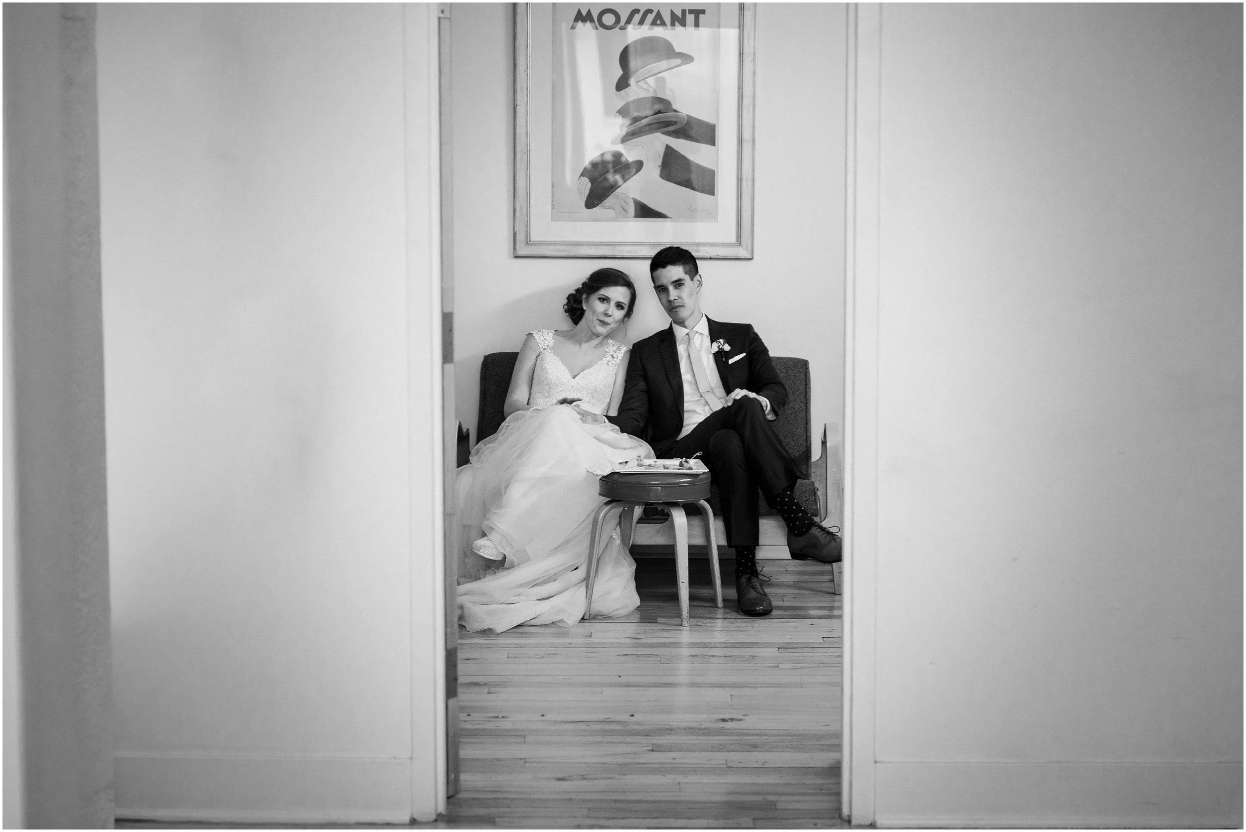 bride and groom sitting in bridal room after ceremony