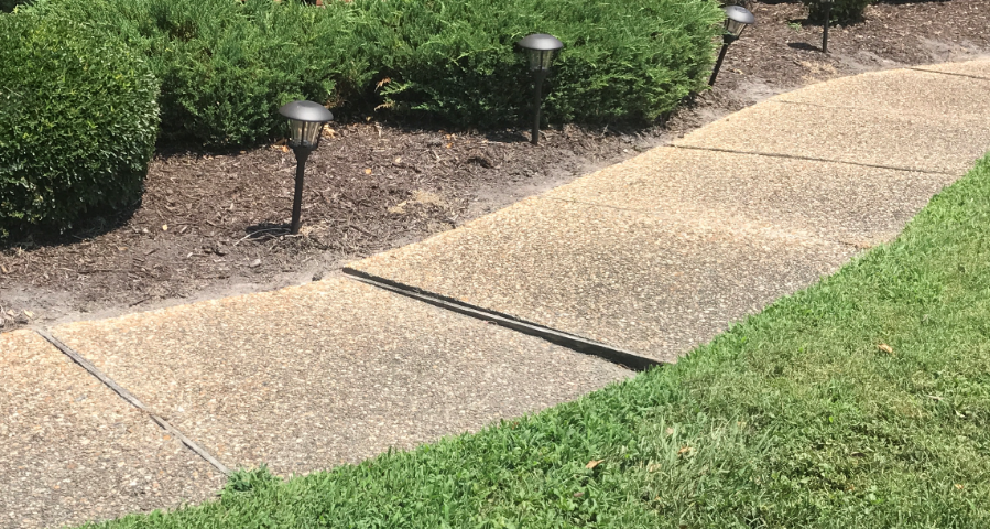 bad_sidewalk_tripping_hazard.png