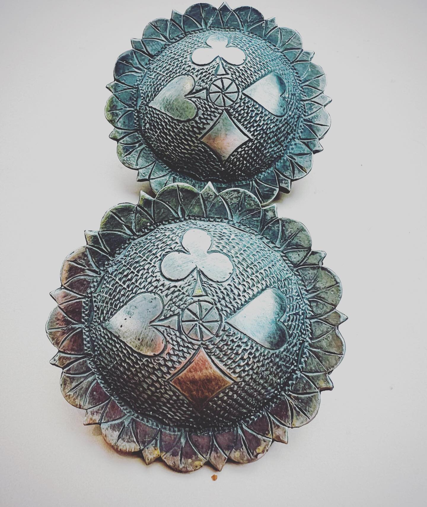 Fantastic pair of older solid sterling silver card suit conchos. These measure just under 2&rdquo; and are marked sterling. They have loop backs that can accommodate up to a 1&rdquo; wide leather. Lots of weight for their size. Asking 300.
