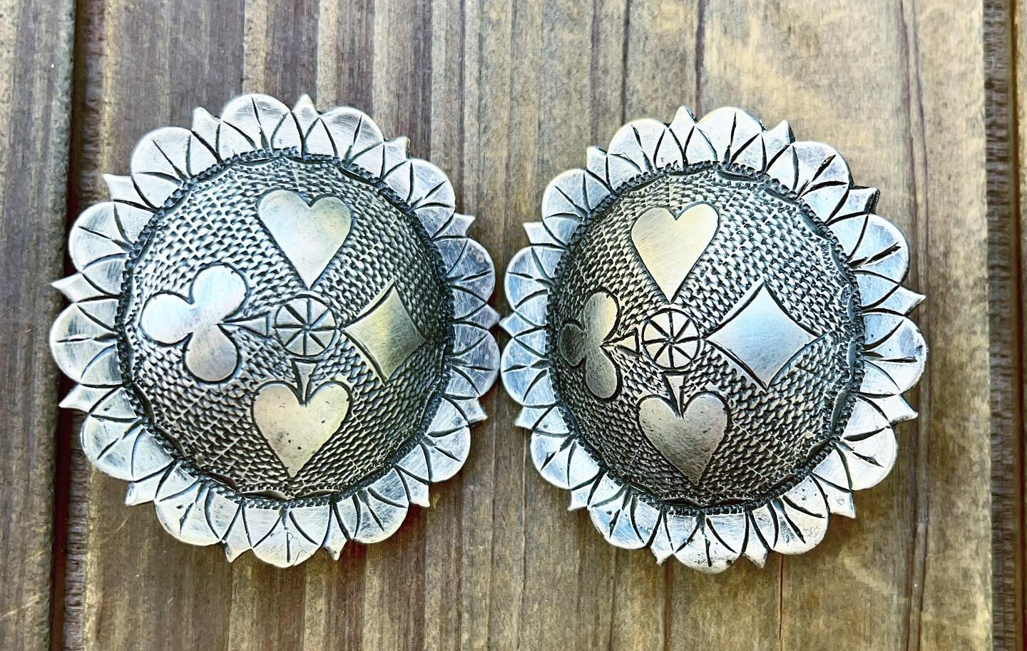 Fantastic pair of older solid sterling silver card suit conchos. These measure just under 2&rdquo; and are marked sterling. Also marked with maker&rsquo;s mark that I can&rsquo;t see clearly; appears to be Fells or Fellz.  They have loop backs that c