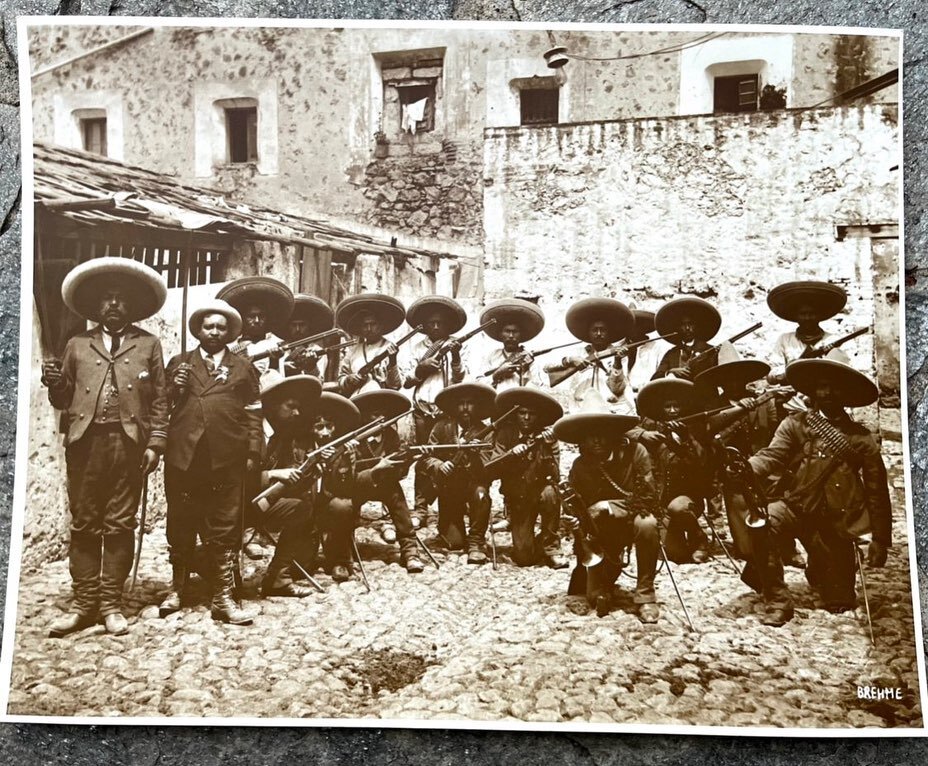 Large format (14&rdquo; x 11&rdquo;) group shot of Pancho Villa&rsquo;s raiders circa 1914. Fantastic details that include Remington Rolling block rifles, Winchester and Marlin lever action rifles, swords, bugles, sombreros, etc. Rare image taken off