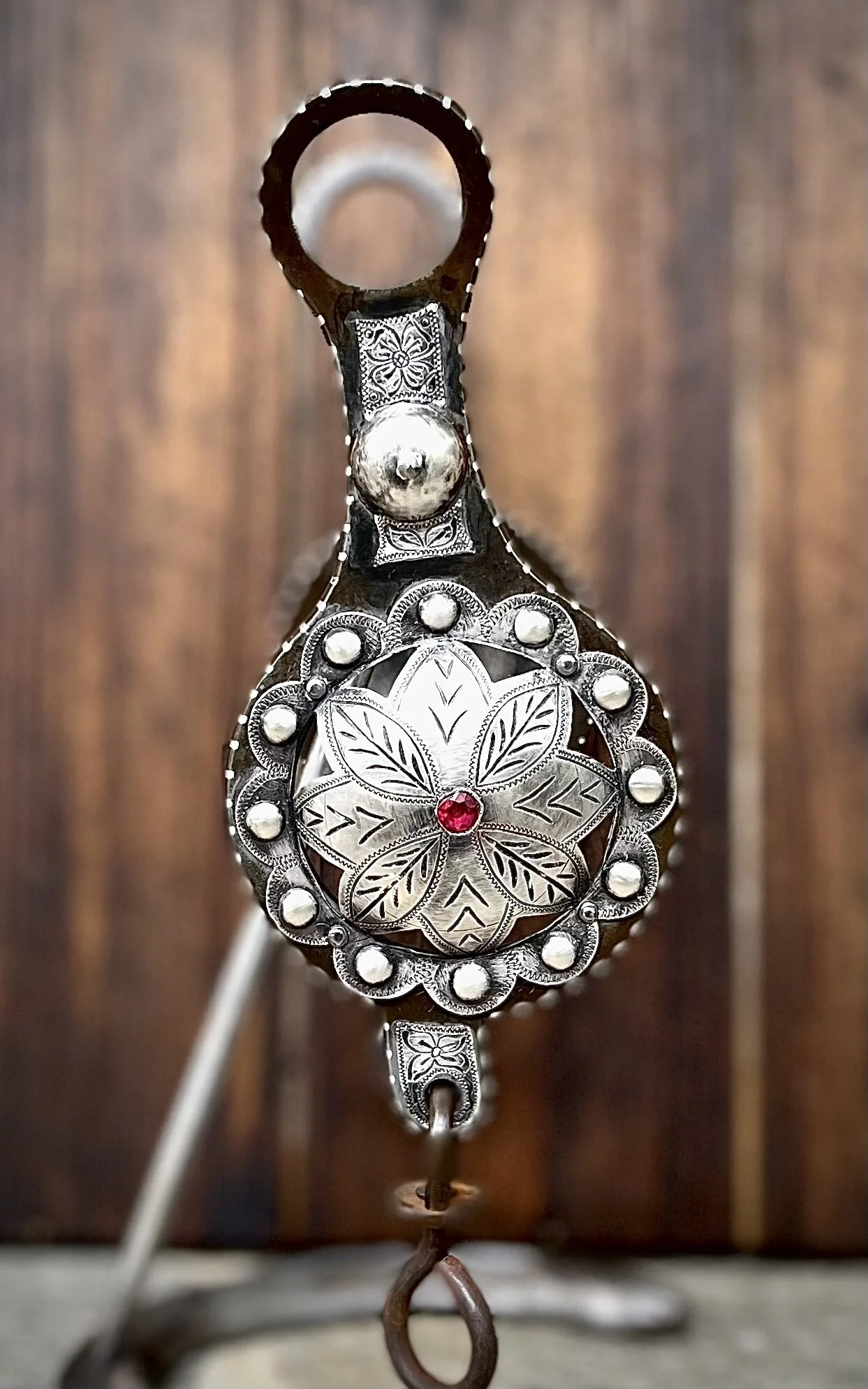 Old Fashioned Globe bit with sterling punched flowers and ruby stones