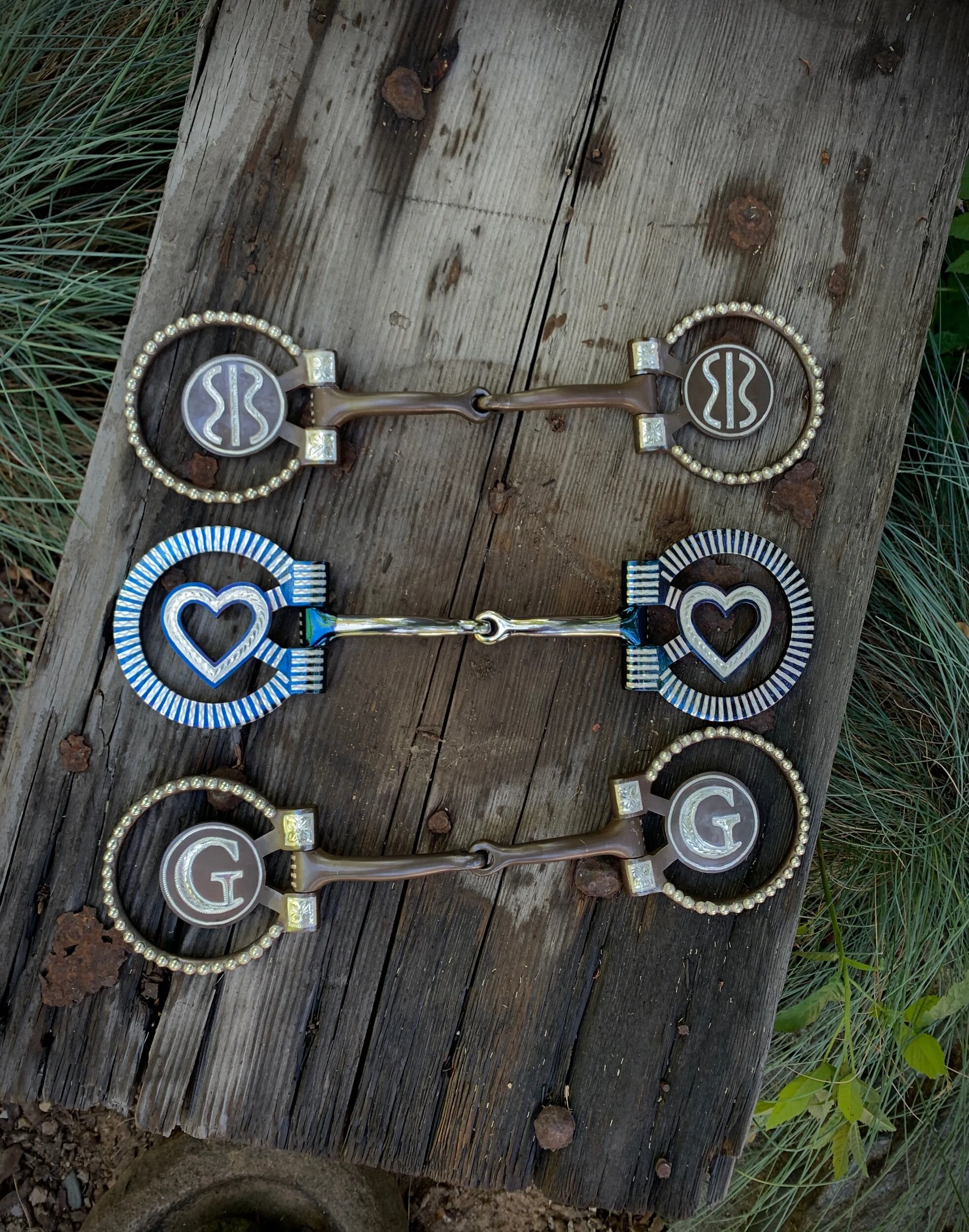 Custom Snaffle bit with open heart and sterling silver inlay