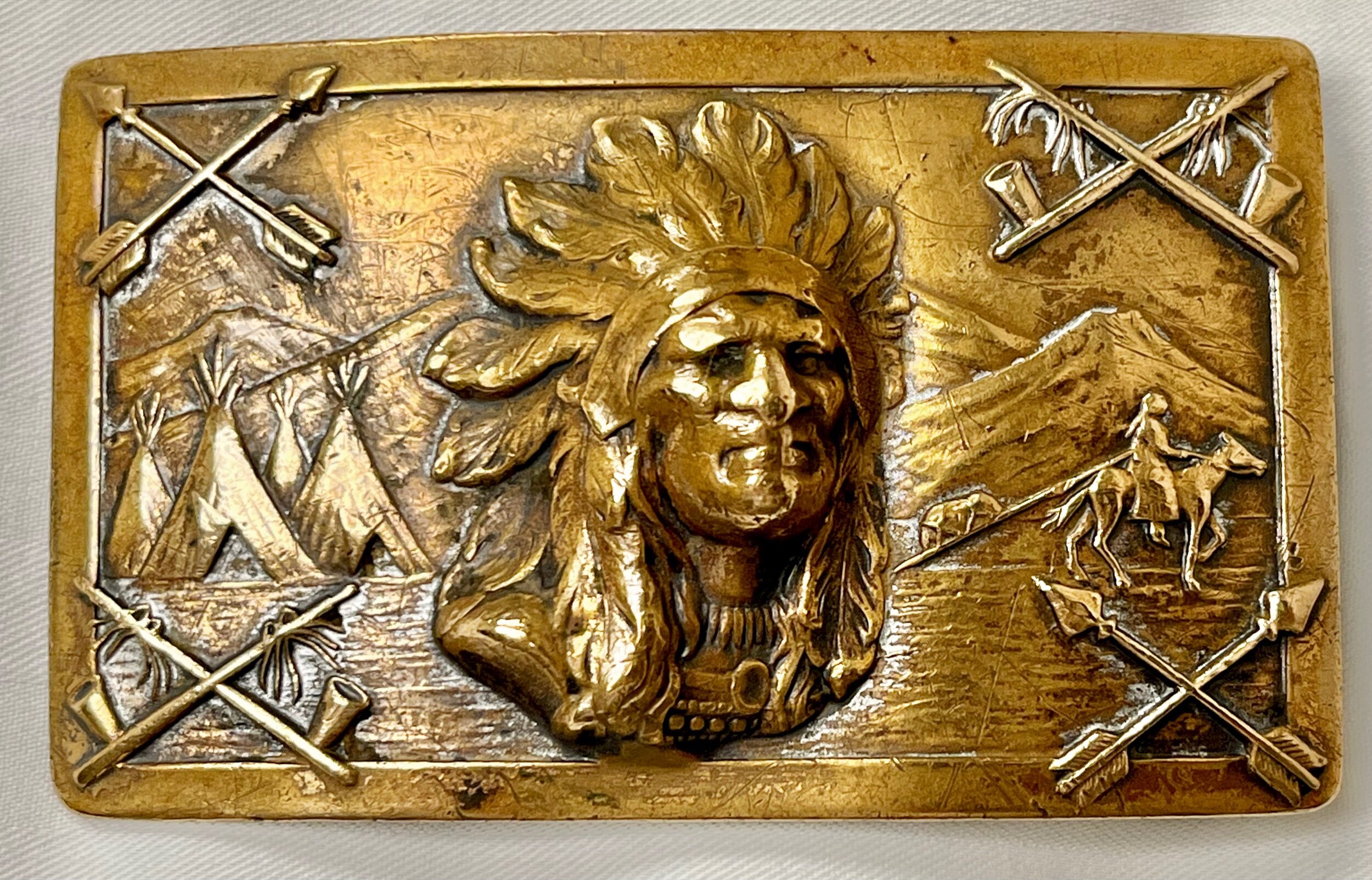 Antique Indian Chief with Warbonnet Brass Belt Buckle — The 